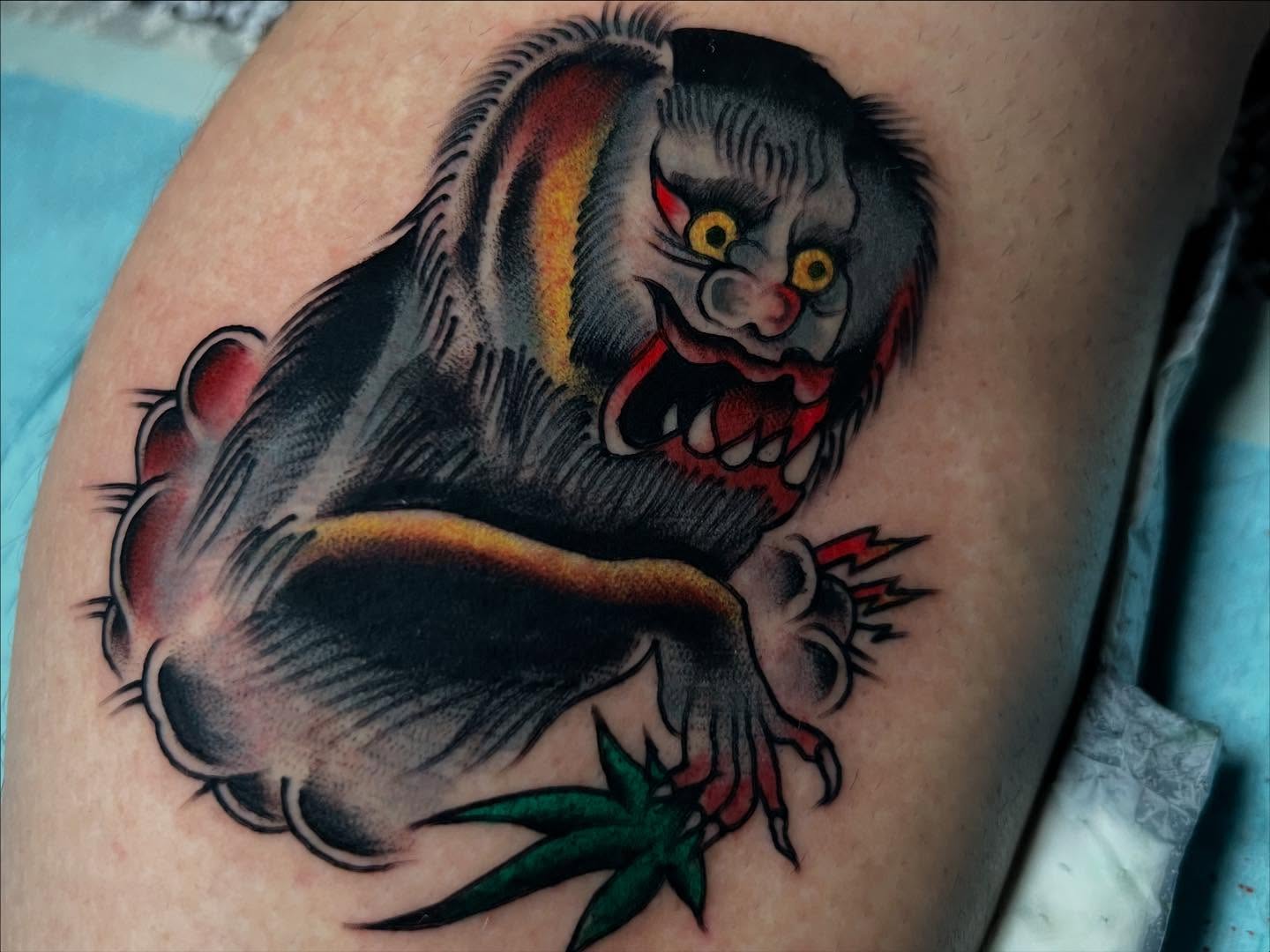 Demon American traditional tattoo on the thigh by Charlie Campanella