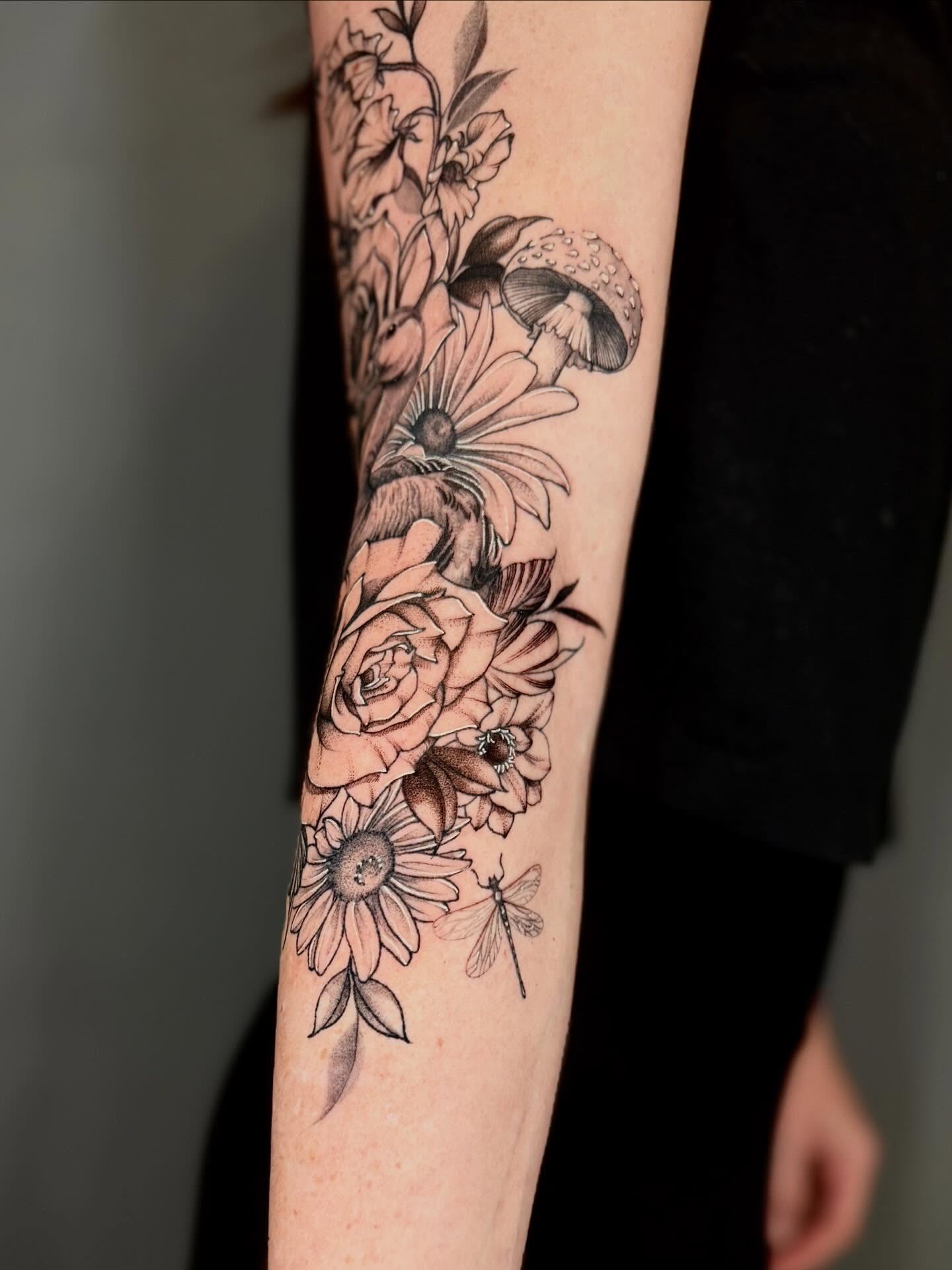 Floral arrangement realism tattoo on the forearm by Amber Starr, Midvale, Utah