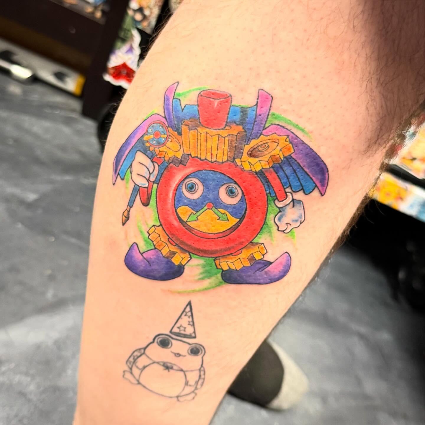 Mechanical creature new school tattoo on the thigh by Katie Rojas