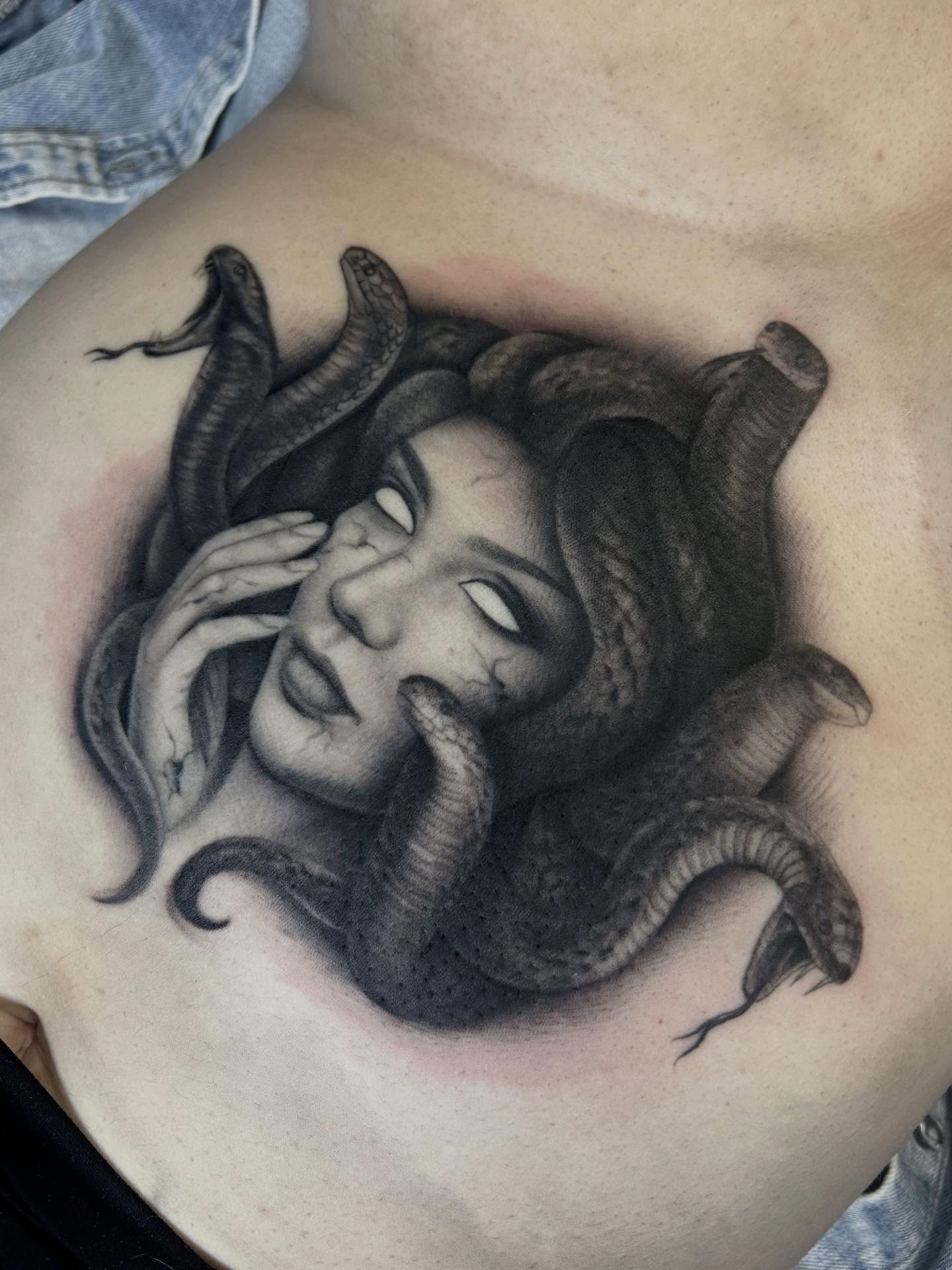 Medusa realism tattoo on the chest by Mary Rose Heckle
