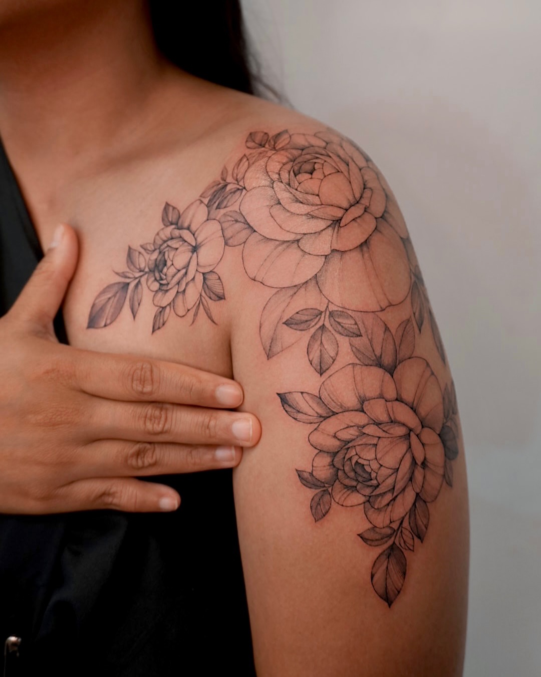 Floral bouquet black and grey tattoo on the shoulder by Hyn[hin]
