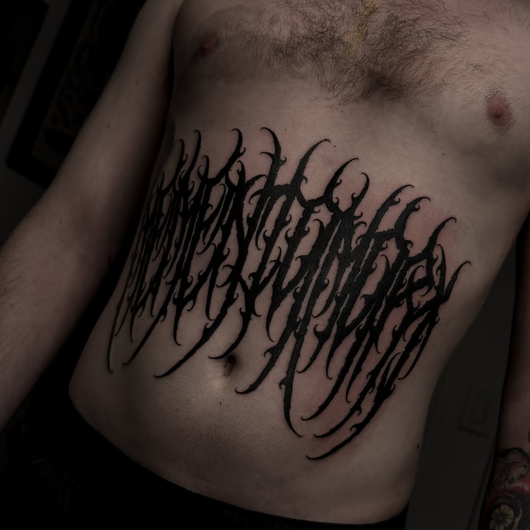 Blackletter script tattoo cyber sigilism tattoo on the ribs by ⚔️Andreas Dolleschal⚔️