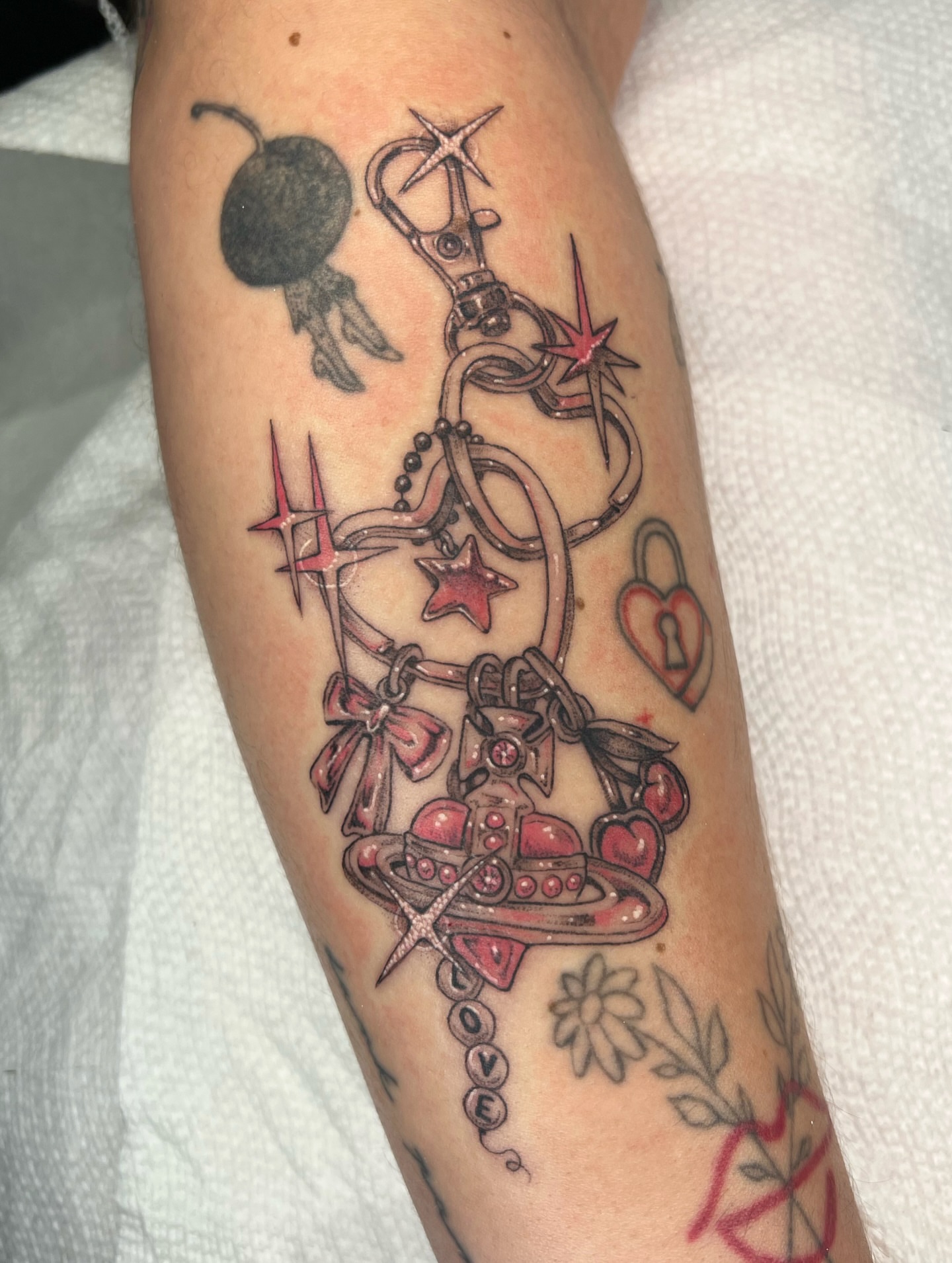 Charm bracelet American traditional tattoo on the forearm by ✮shayla ganong✮