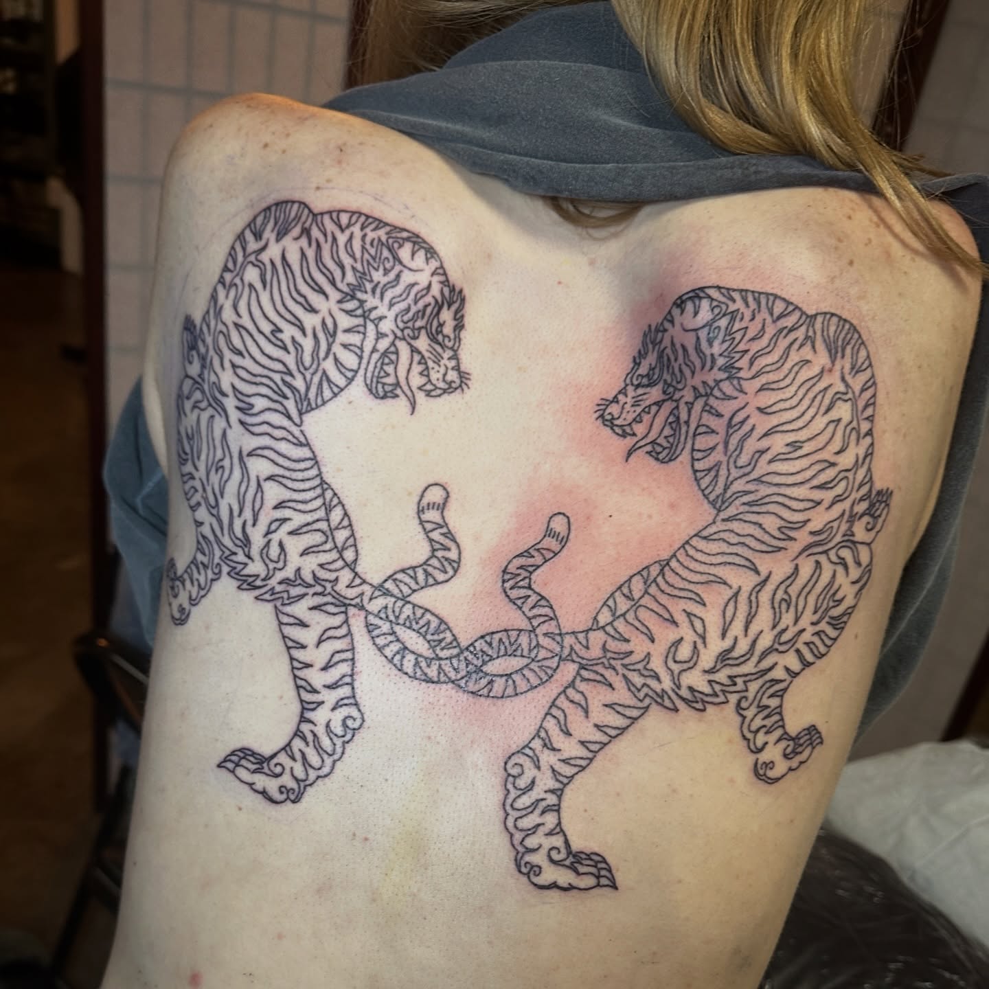 Tigers black and grey tattoo on the back by Luisa Gonzalez, Austin, Texas