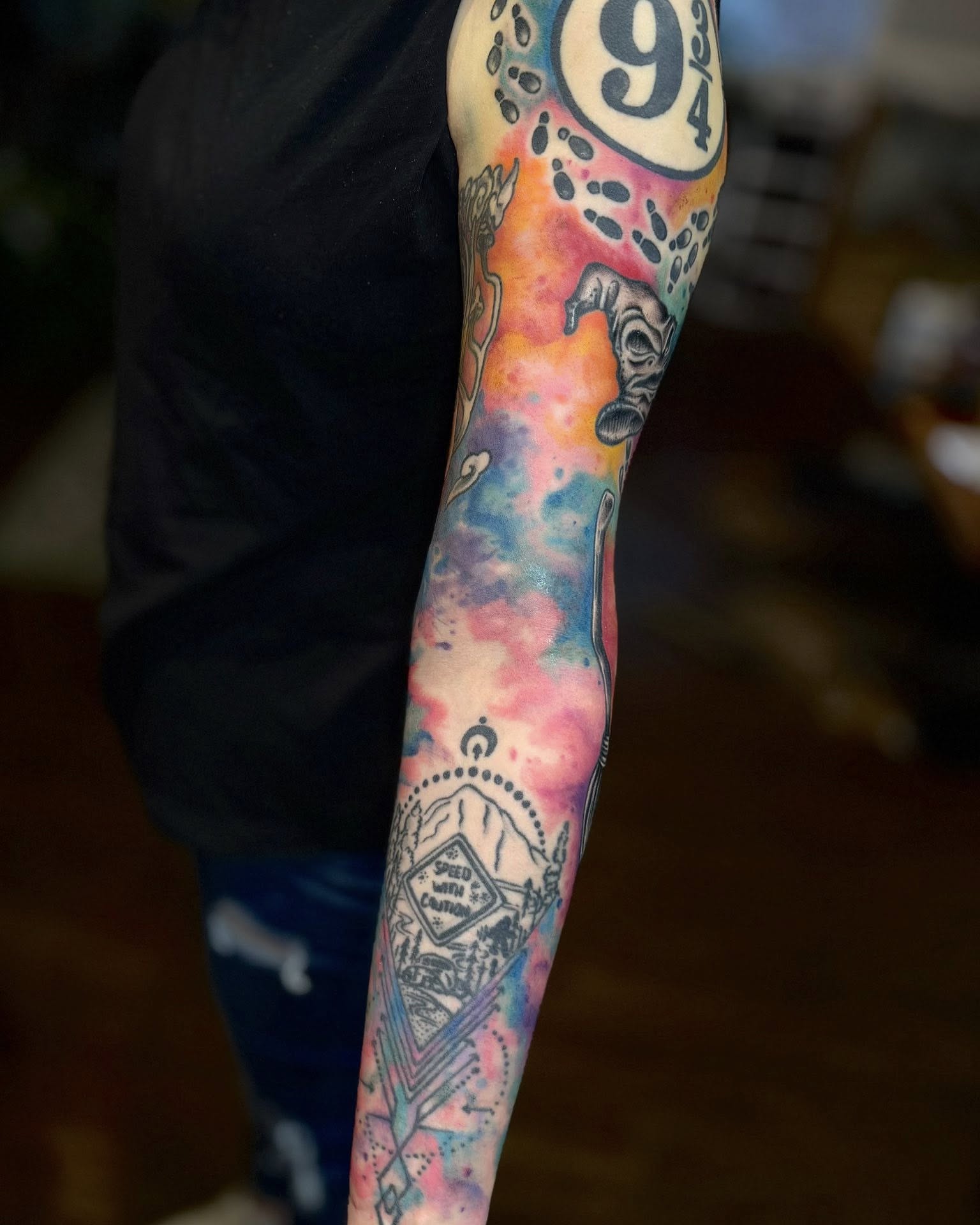 Watercolor galaxy watercolor tattoo on the forearm by Eden Rose, Kalama, Washington