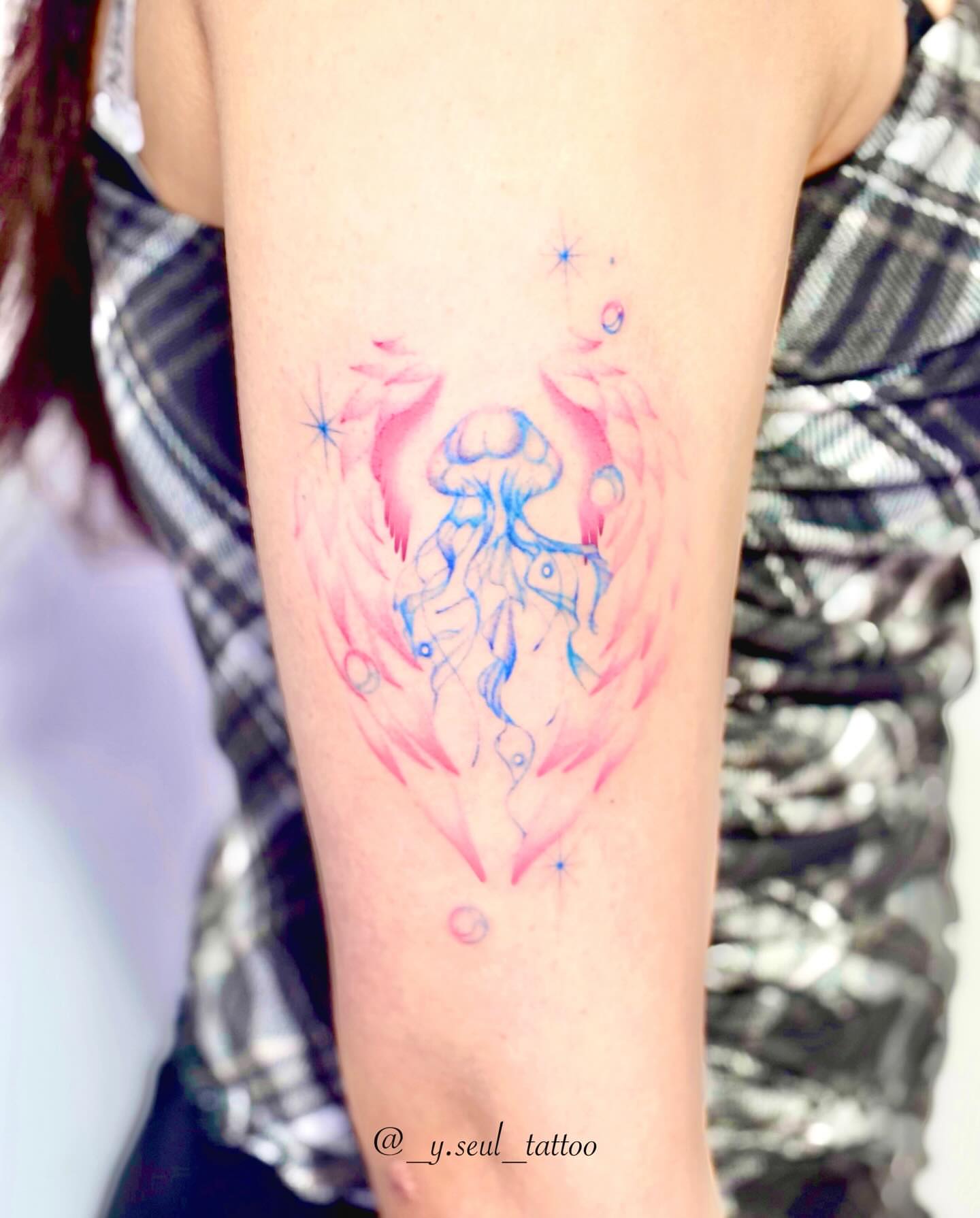 Tattoo by @_y.seul_tattoo — watercolor