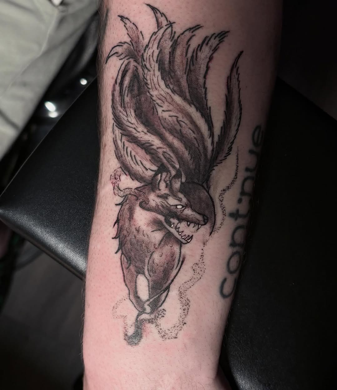 Nine-tailed fox sketch tattoo on the forearm by Angel Arceo