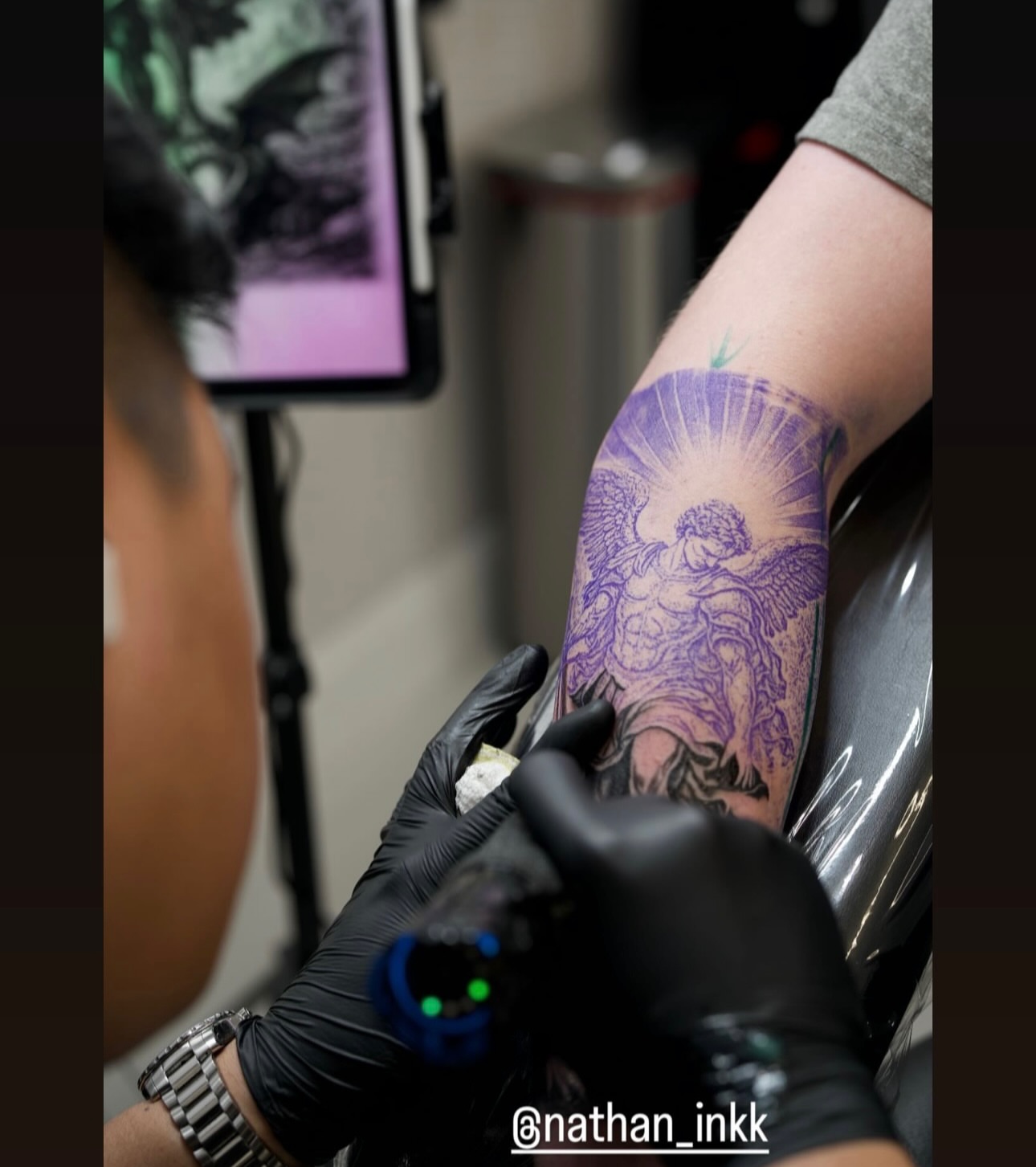 Angel with sunburst neo-traditional tattoo on the forearm by Nathan, Charlotte, North Carolina