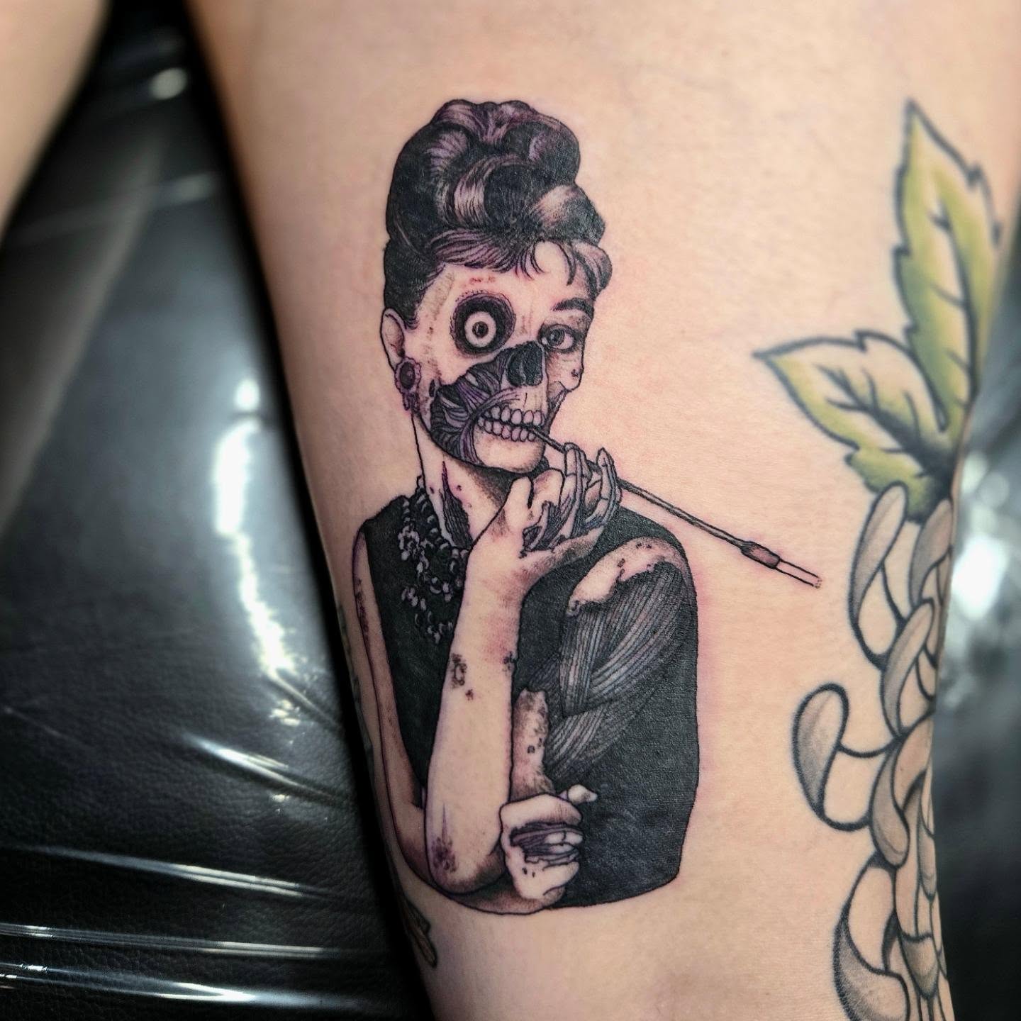 Audrey Hepburn skeleton realism tattoo on the thigh by Amanda Hinrichs