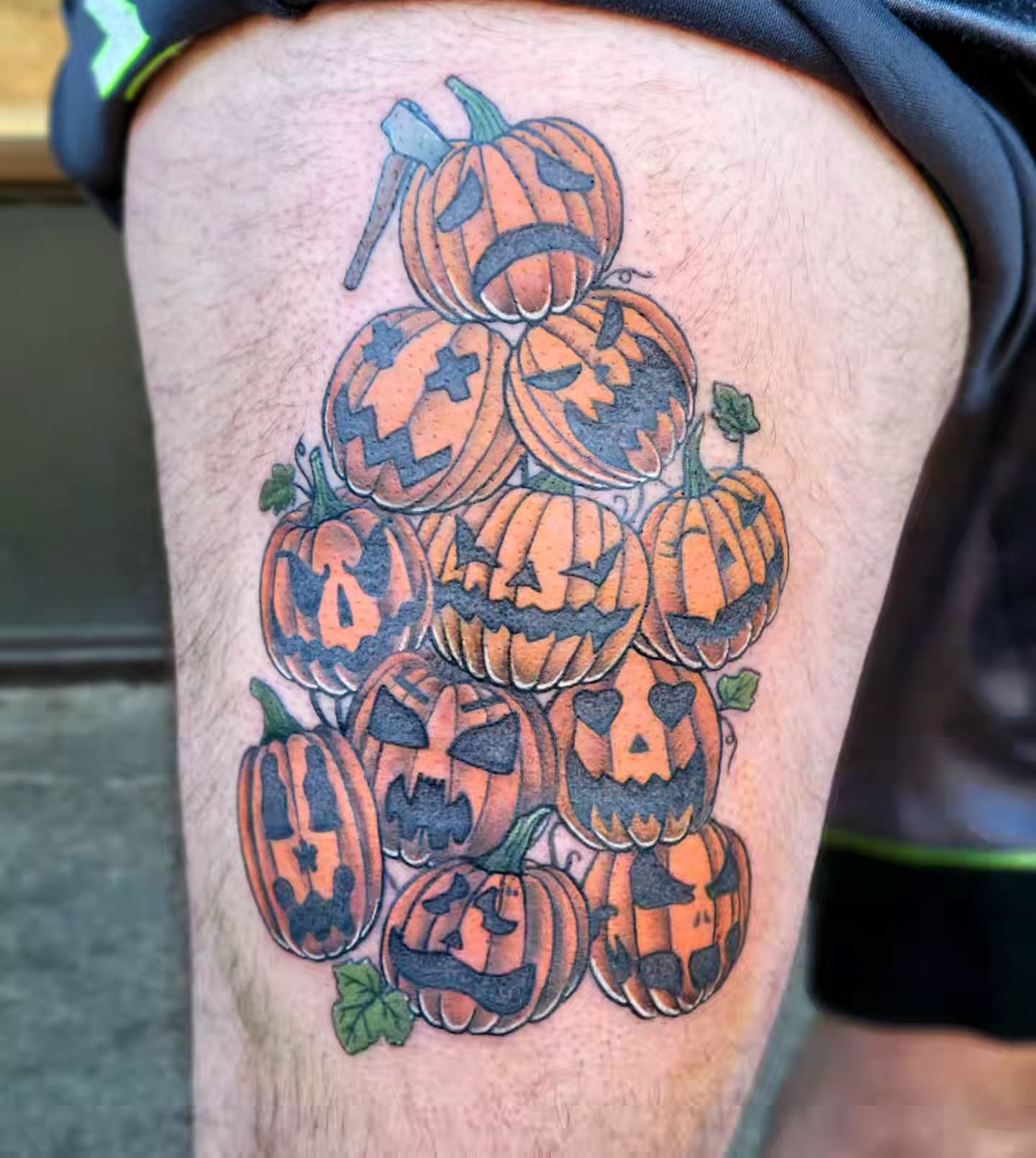 Pumpkin pile American traditional tattoo on the thigh by Jessica Czernics, Pittsburgh, Pennsylvania
