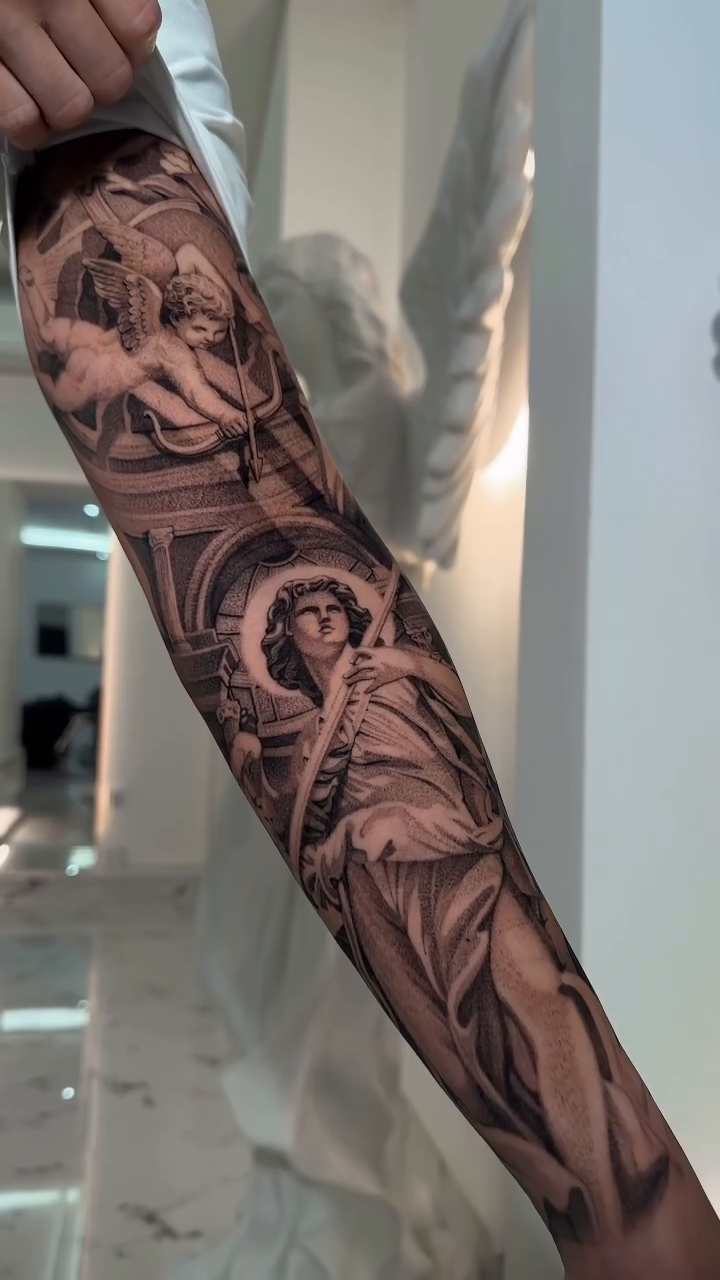 Angels and architectural elements realism tattoo by Viktor Govorukhin