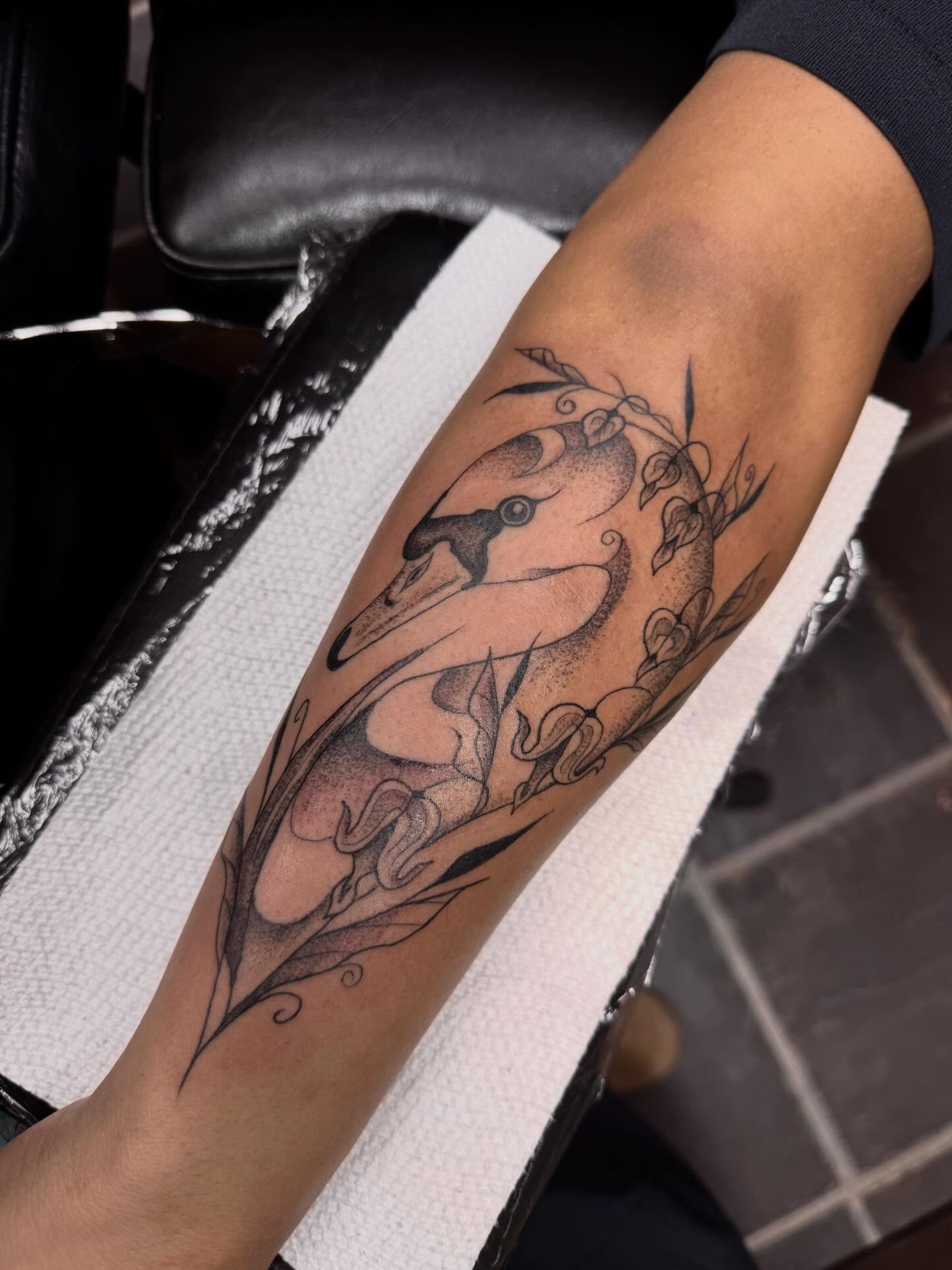 Abstract design black and grey tattoo on the forearm by olivia reed