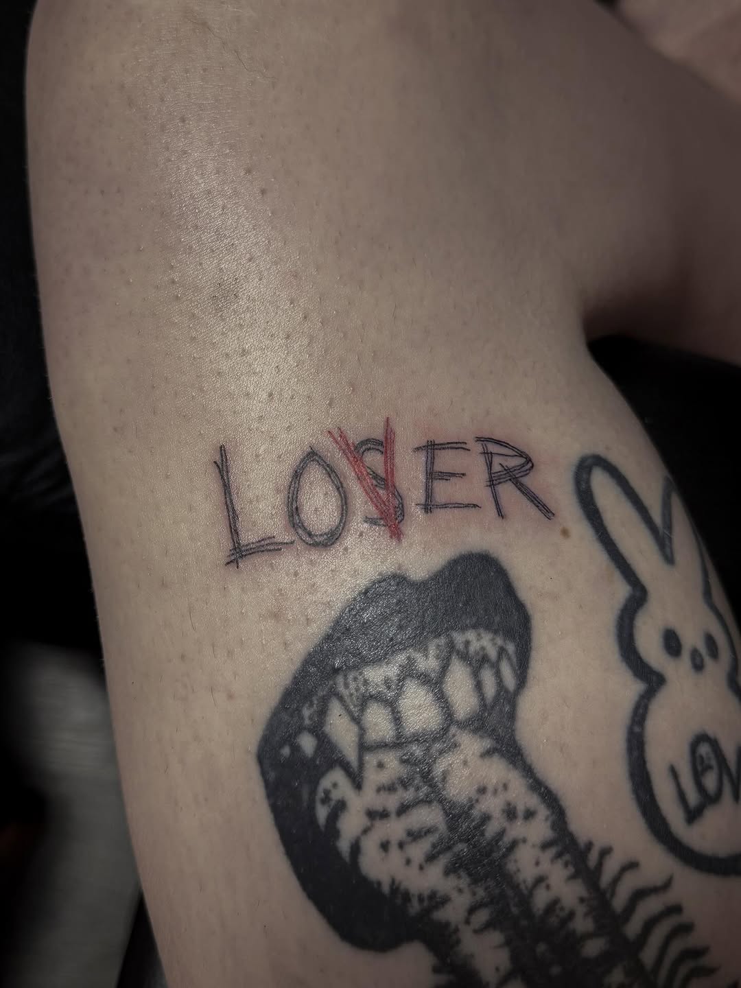 LOSER text with red cross-out minimalist tattoo on the upper arm by ☆ ciara ☆