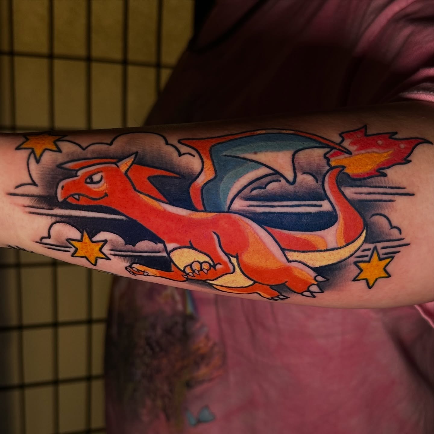 Dragon American traditional tattoo on the forearm by Robert Douglas