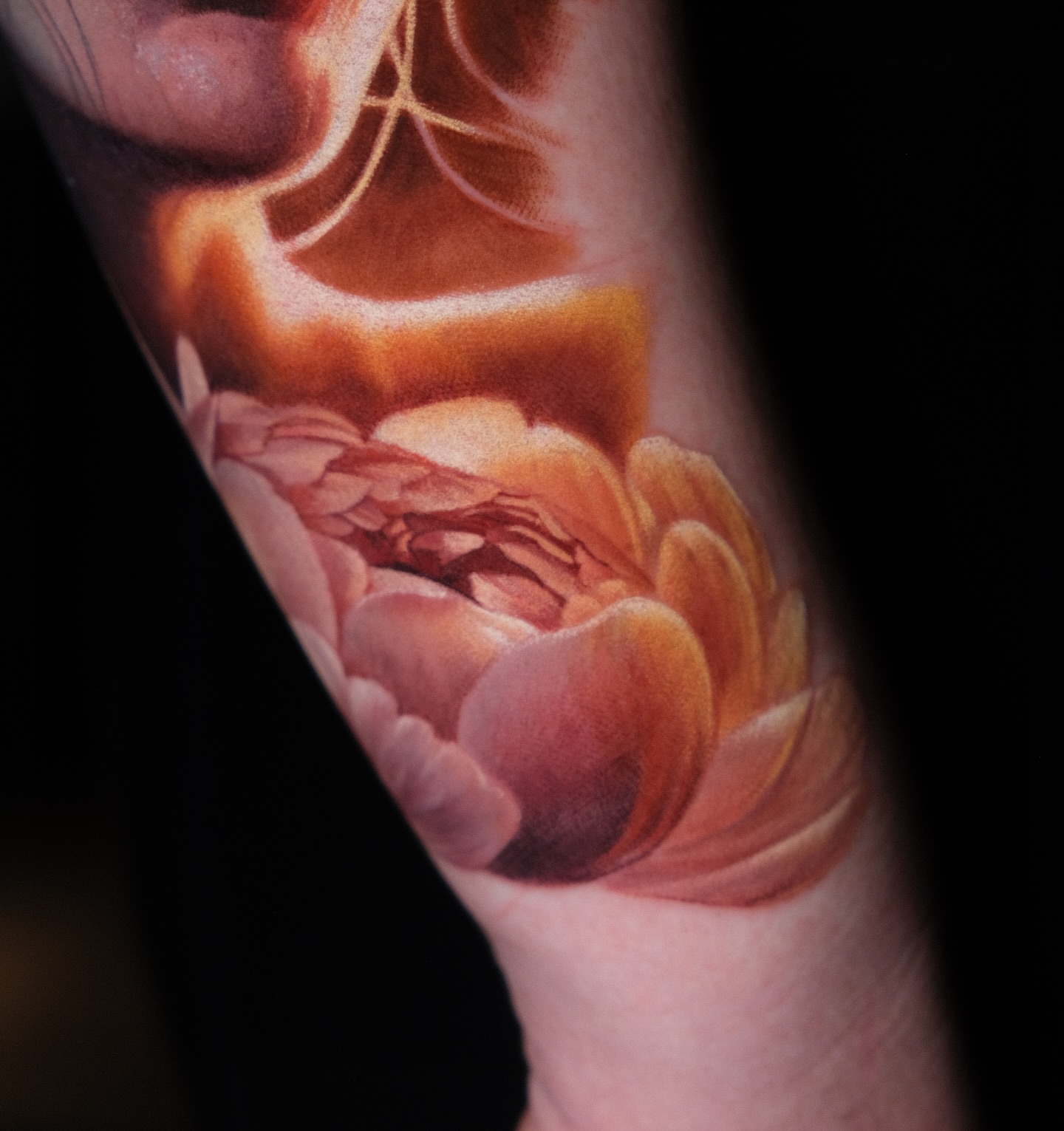 Peony realism tattoo on the forearm by Naboka Anastasiia