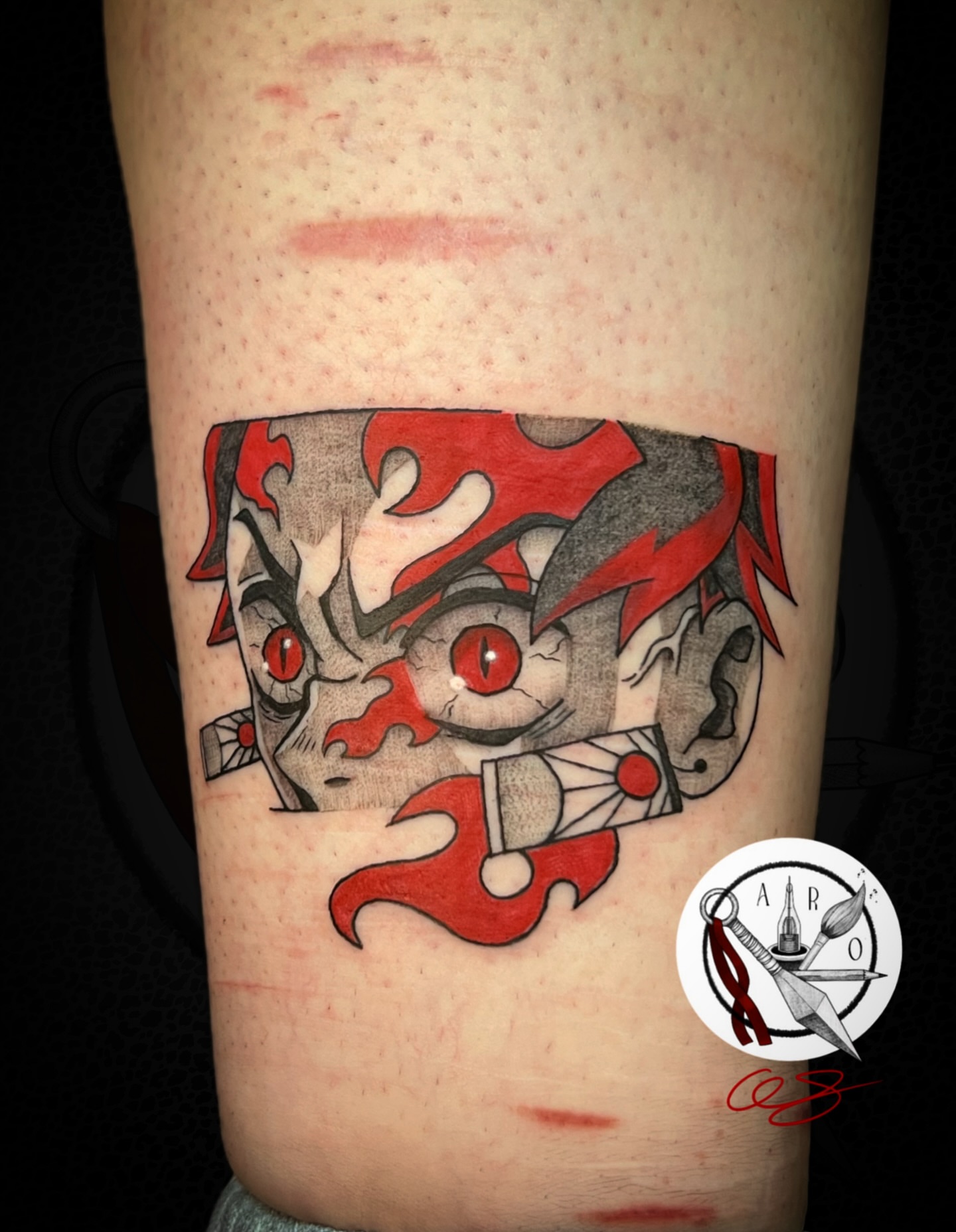 Demon mask American traditional tattoo on the forearm by Aaron Strobehn