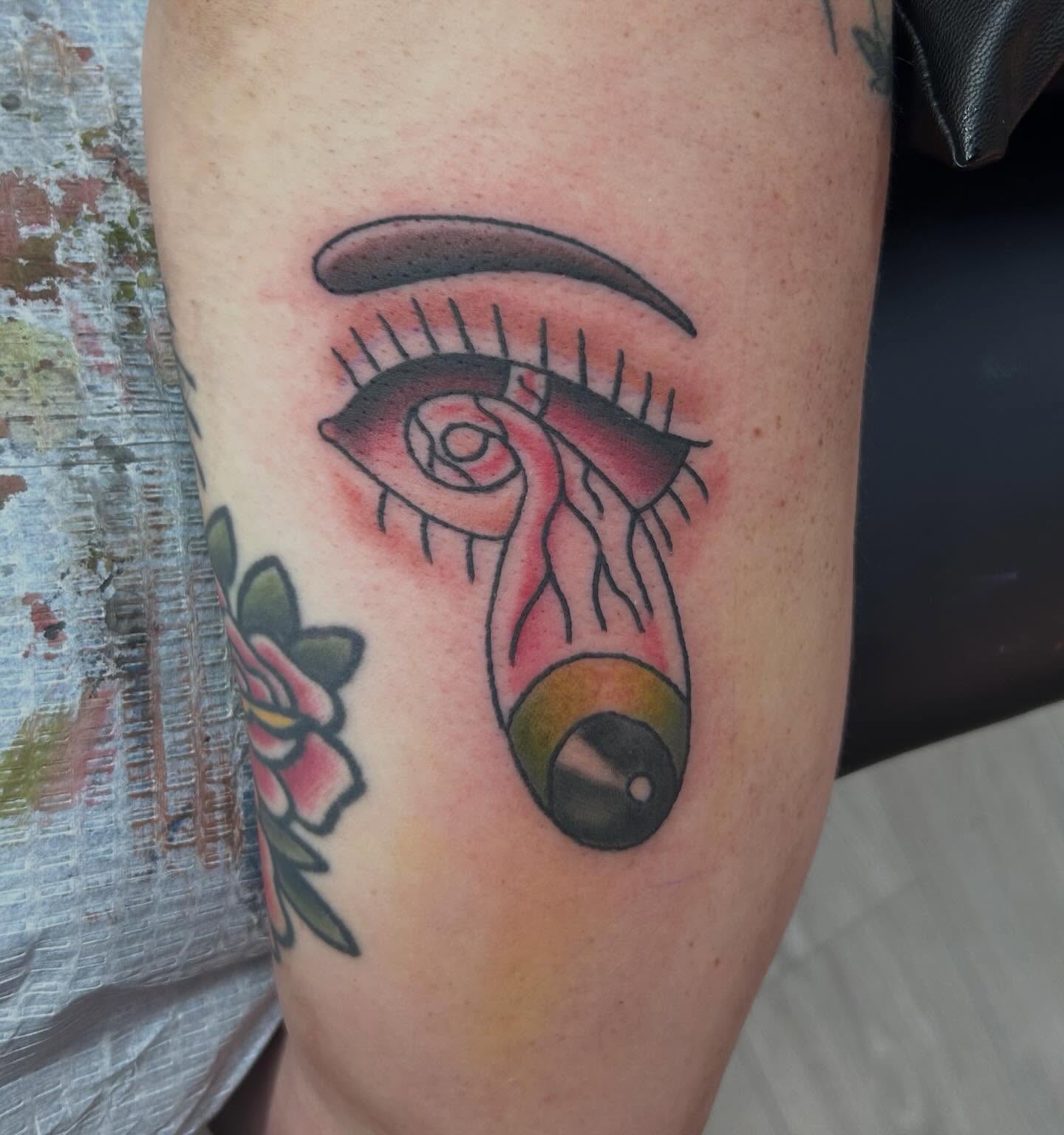 Eye with feather American traditional tattoo on the forearm by Red✨, Gansevoort, New York