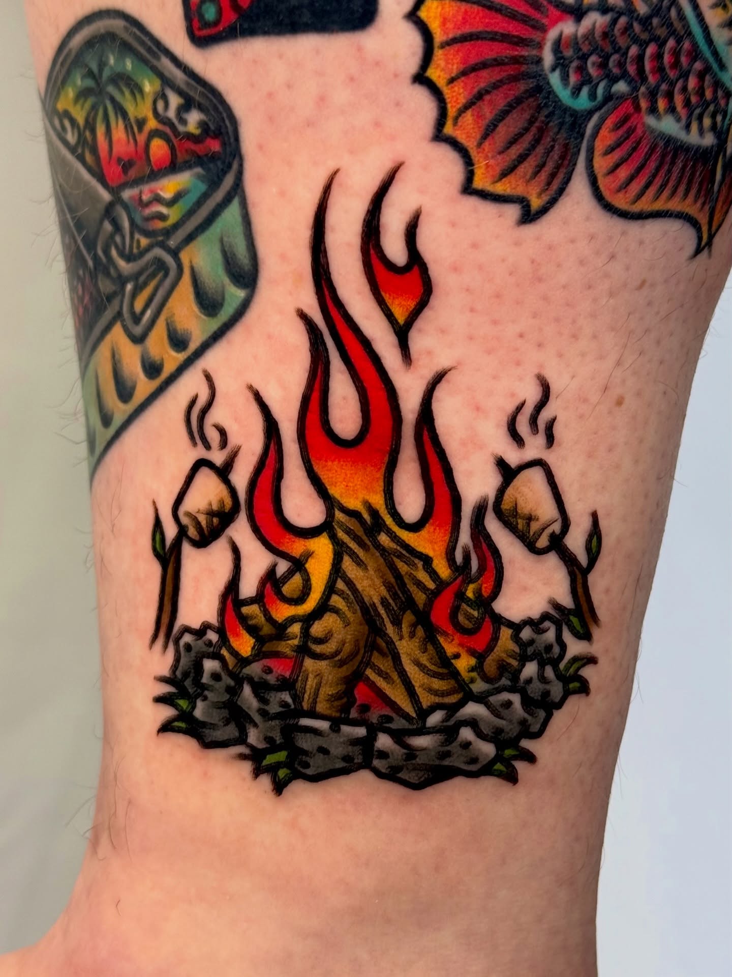 Campfire with marshmallows American traditional tattoo on the forearm by Tattooer Sancho 🇰🇷🇨🇦