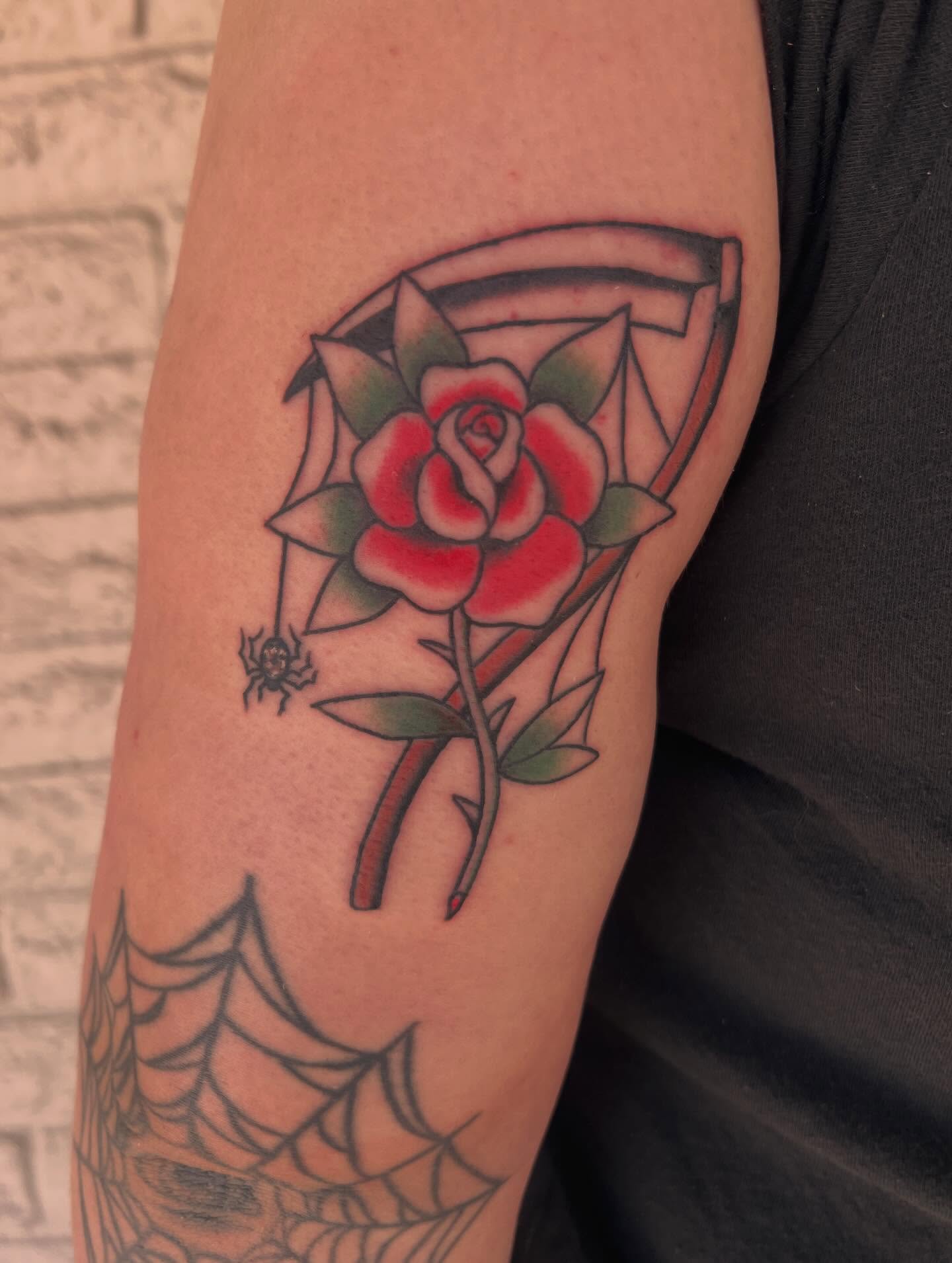 Rose with spider American traditional tattoo on the forearm by Samantha Citer