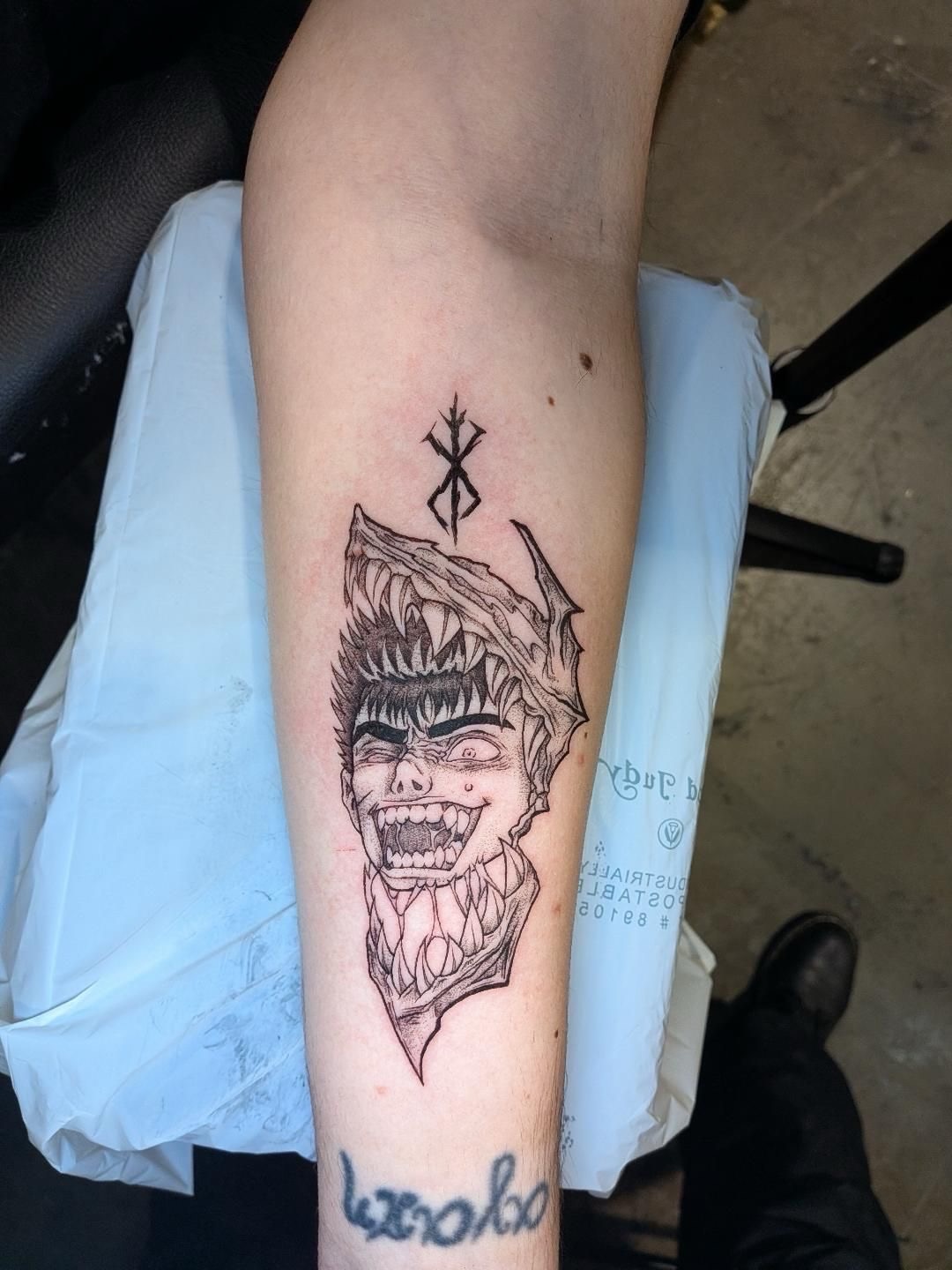 Demon head dark realism tattoo on the forearm by L U C y, Knoxville, Tennessee