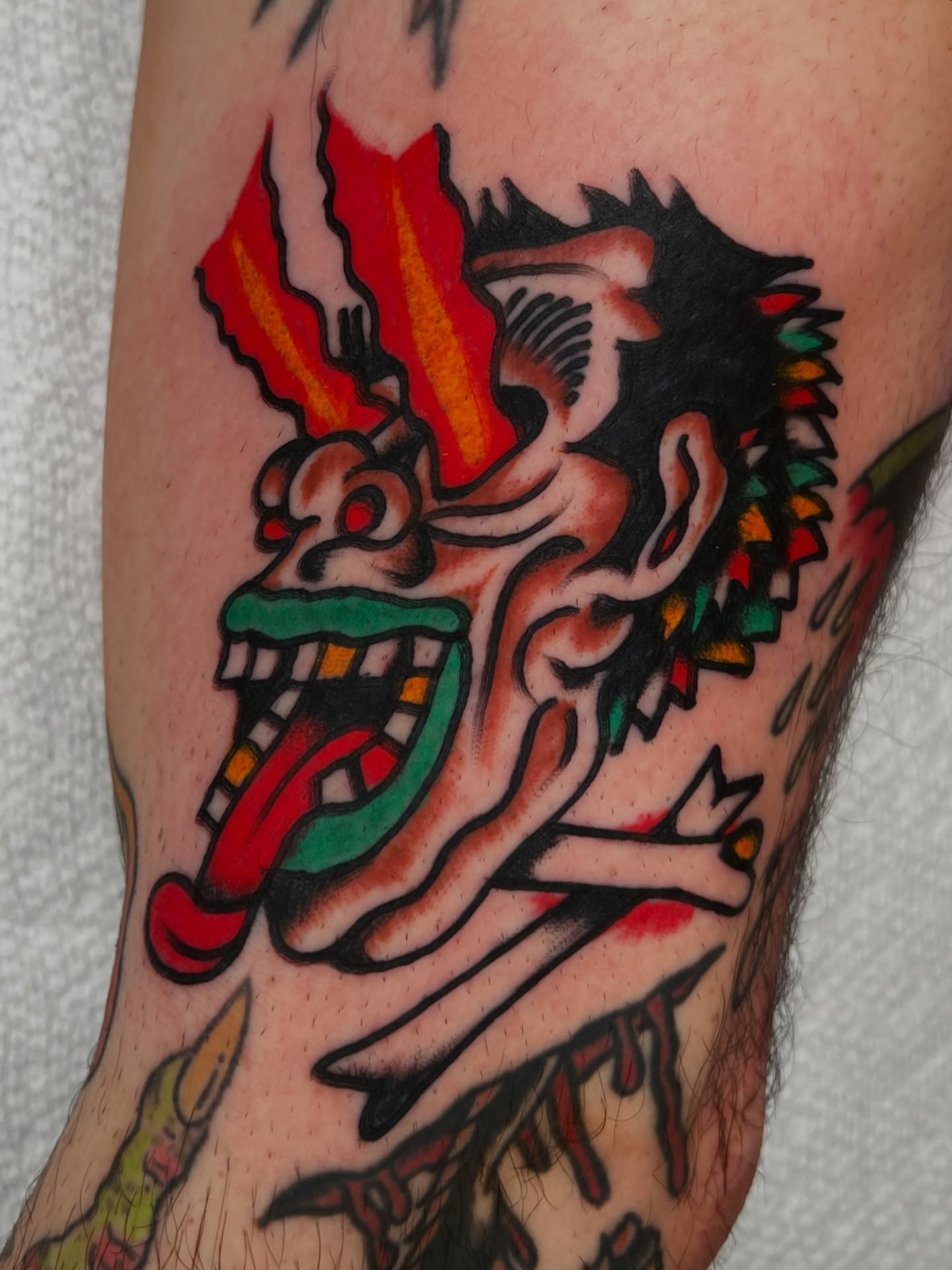 Jester American traditional tattoo on the forearm by 💥Jeff Klug💥, Austin, Texas
