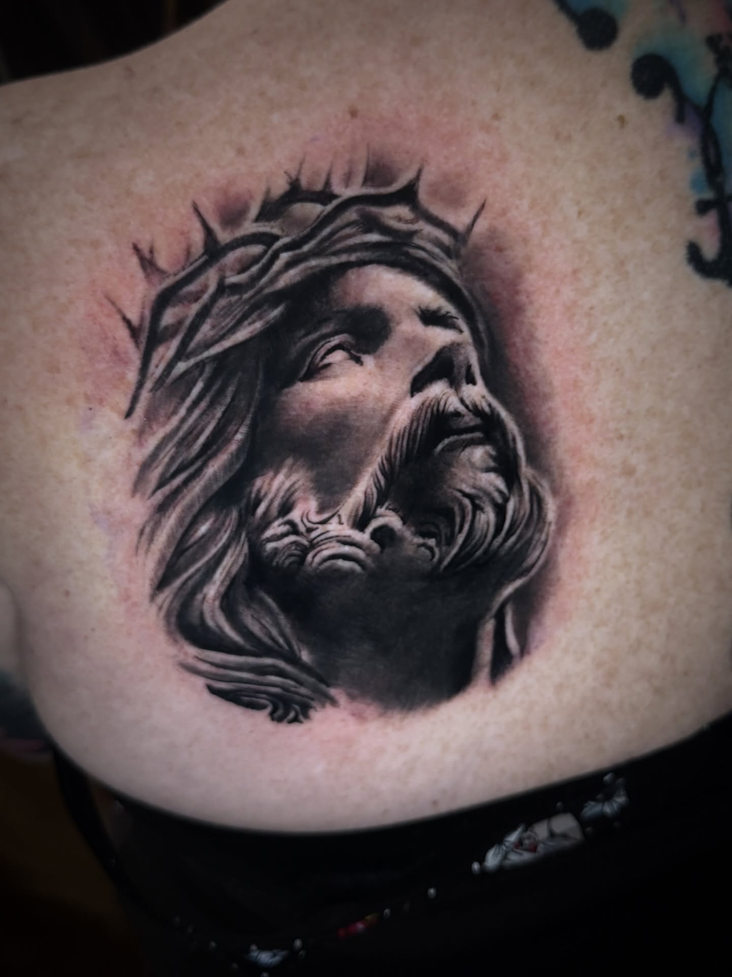 Jesus Christ realism tattoo on the chest by Donald Reynolds