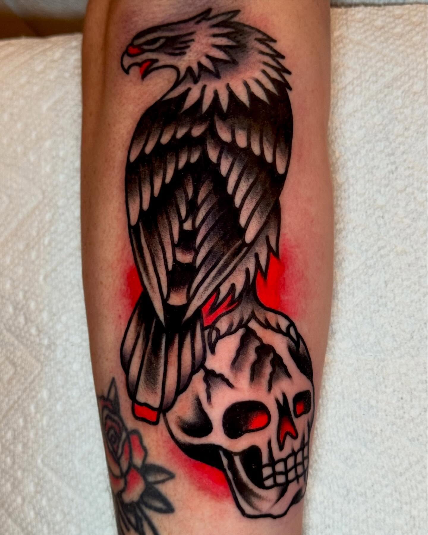 Eagle and skull American traditional tattoo on the forearm by Eli Bernal