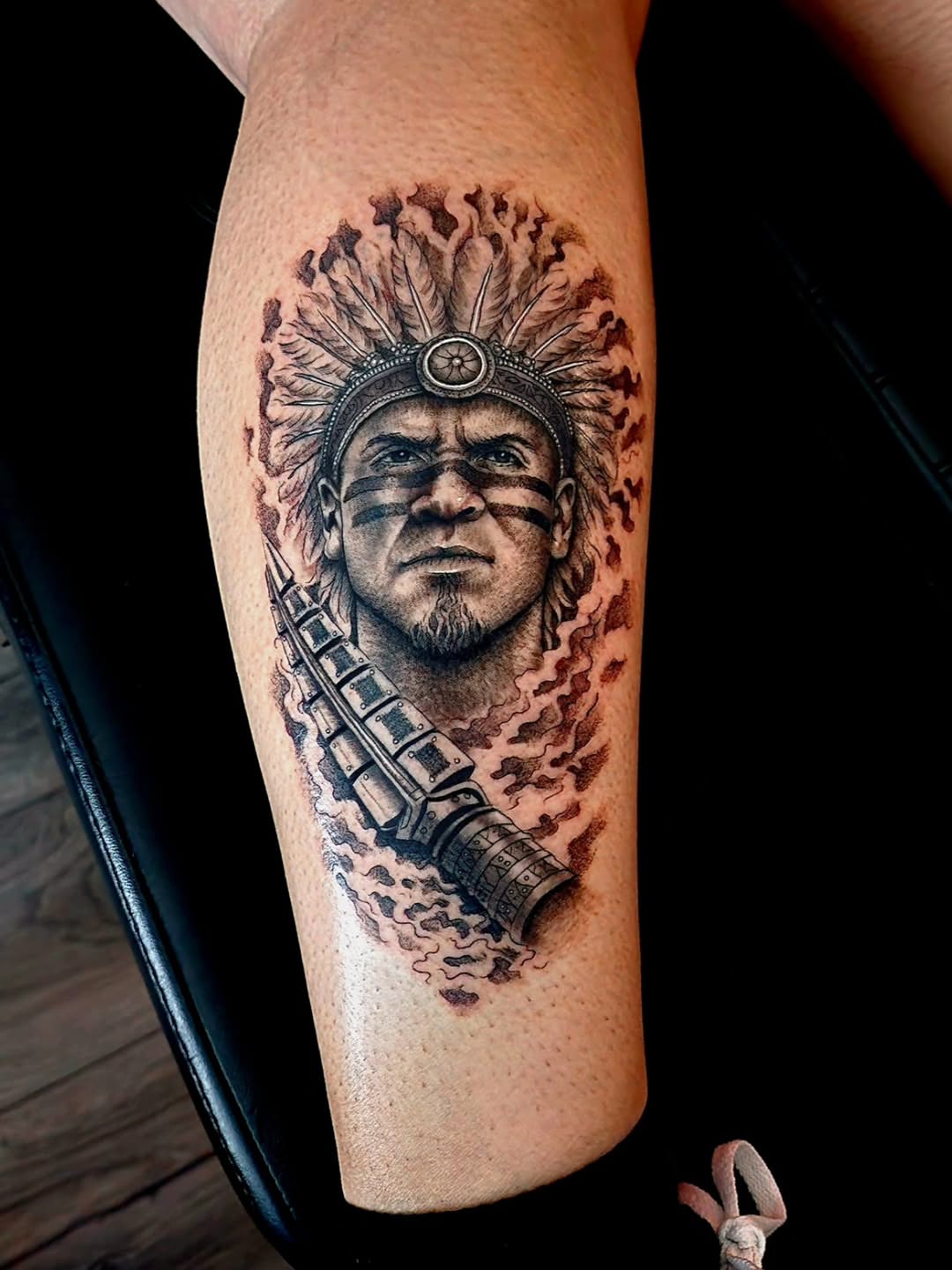 Indian chief with machine gun realism tattoo on the forearm by Luke Jordan Ink, Louisville, Colorado