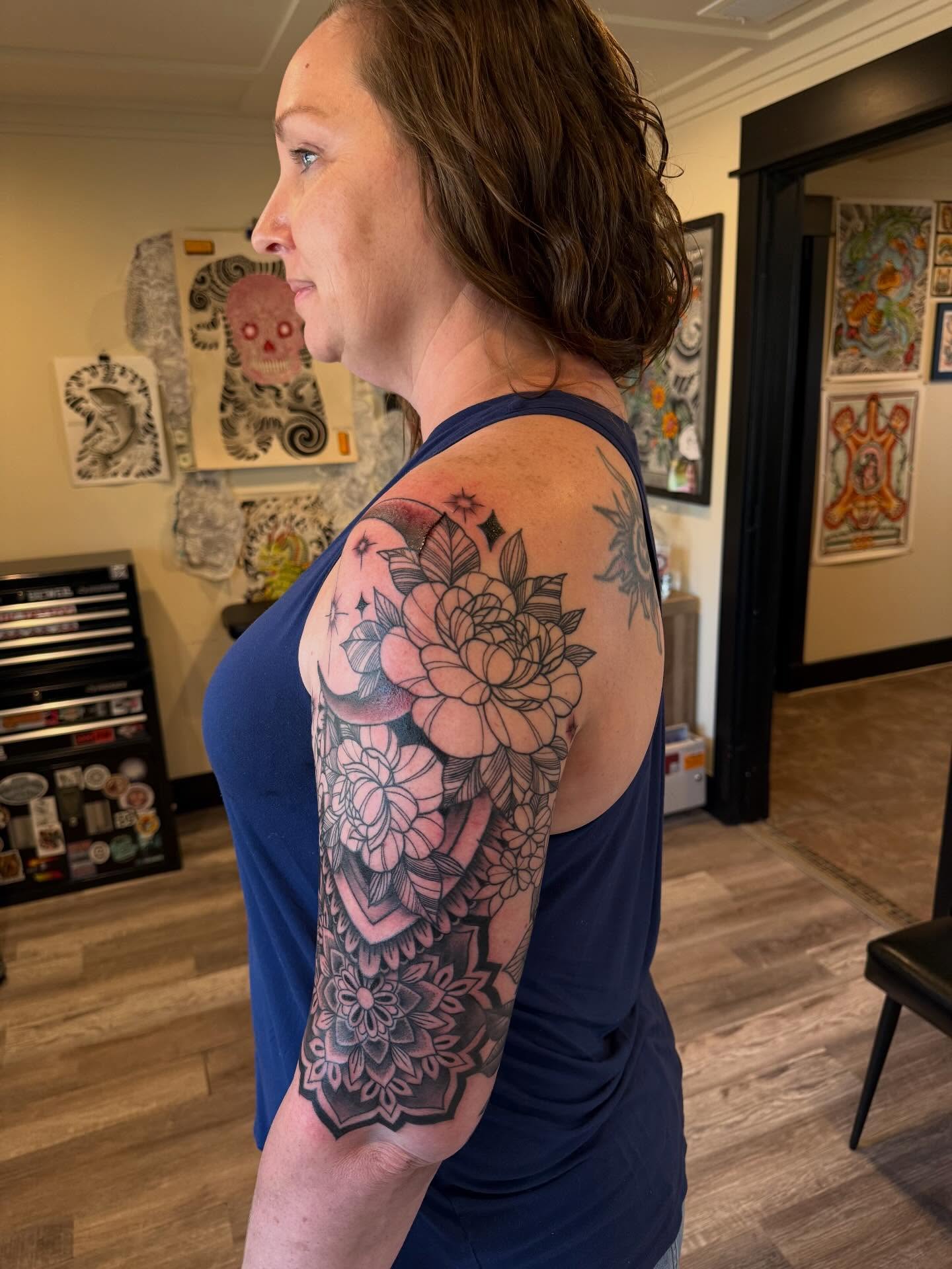 Floral sleeve japanese irezumi tattoo on the upper arm by Rebecca Basma Smith