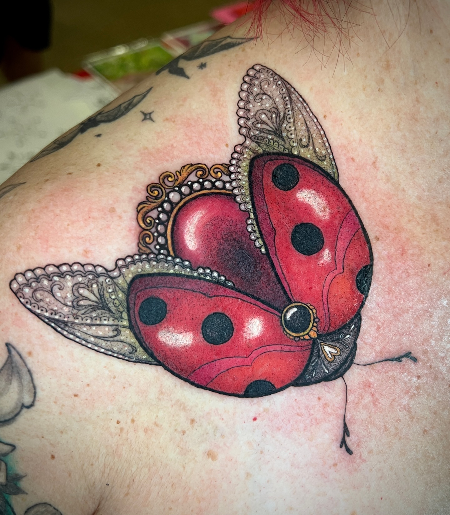 Ladybug realism tattoo on the shoulder by ✨ Pata Pardee ✨ illustration tattoo