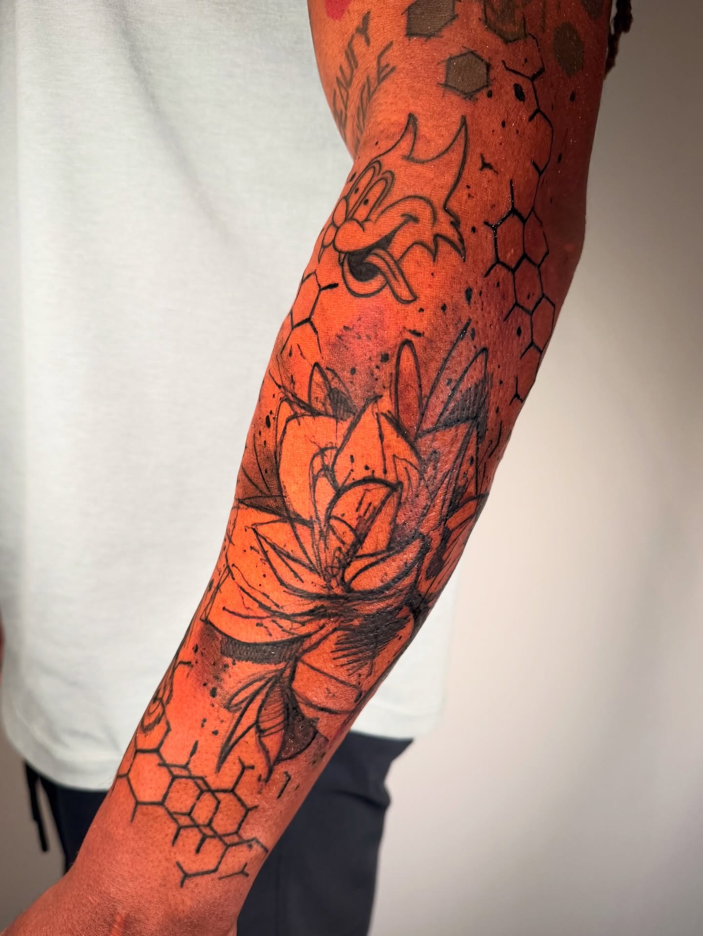 Flower and dragon geometric tattoo on the forearm by Georgios Papadopoulos Tattoo Artist Los