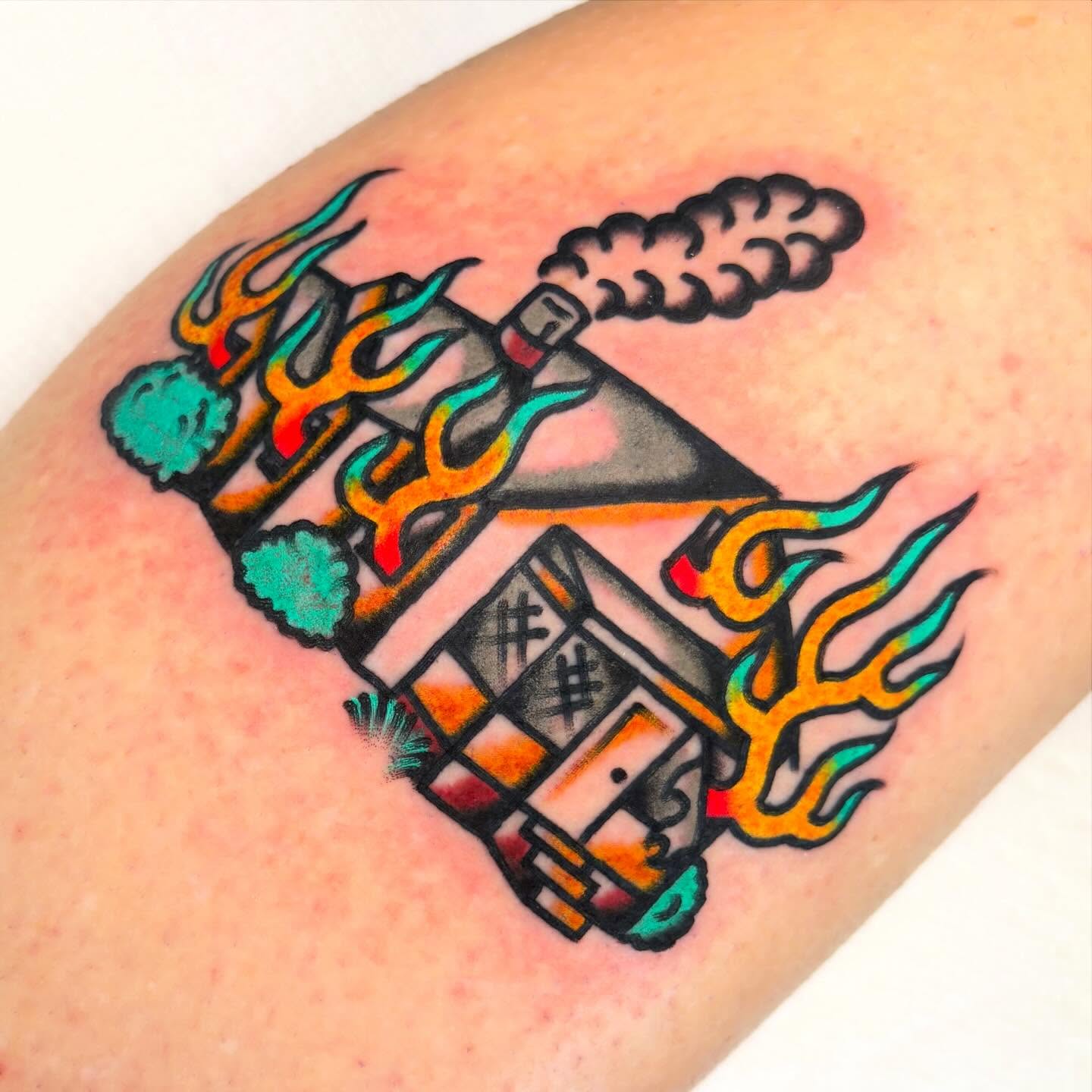 Flame and bottle American traditional tattoo on the forearm by Zoe Margot