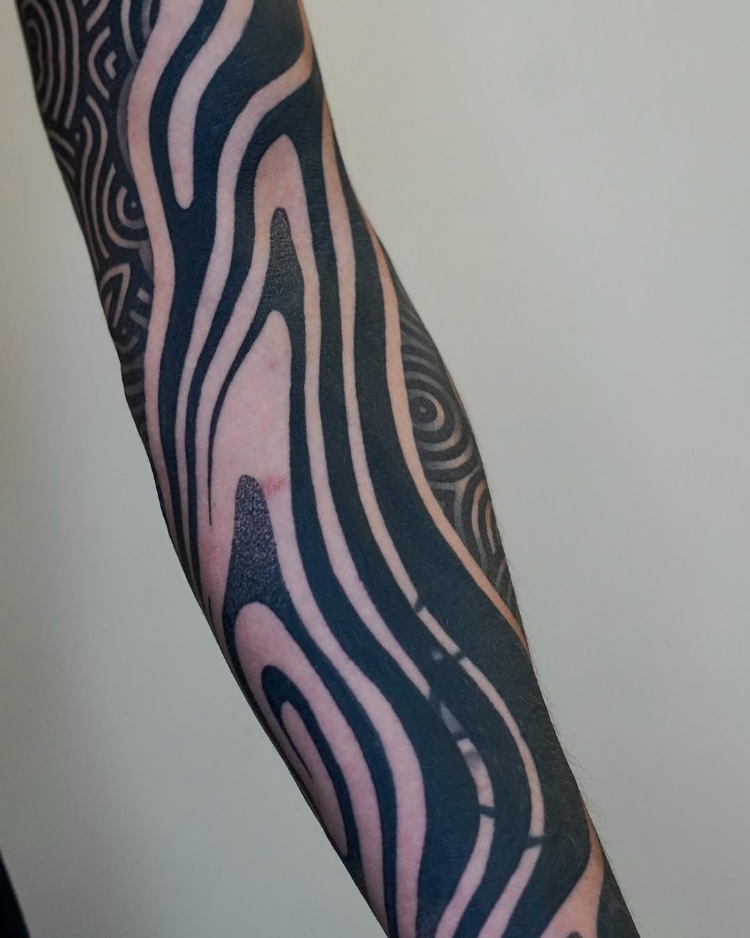 Tattoo by @rjxdots — blackwork, geometric
