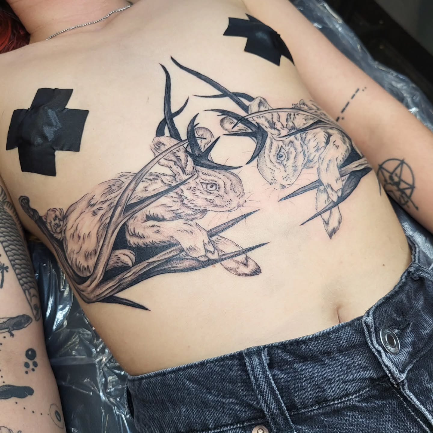 Deer and rabbit realism tattoo on the ribs by Jenna 🖤 Tattoos Denton TX