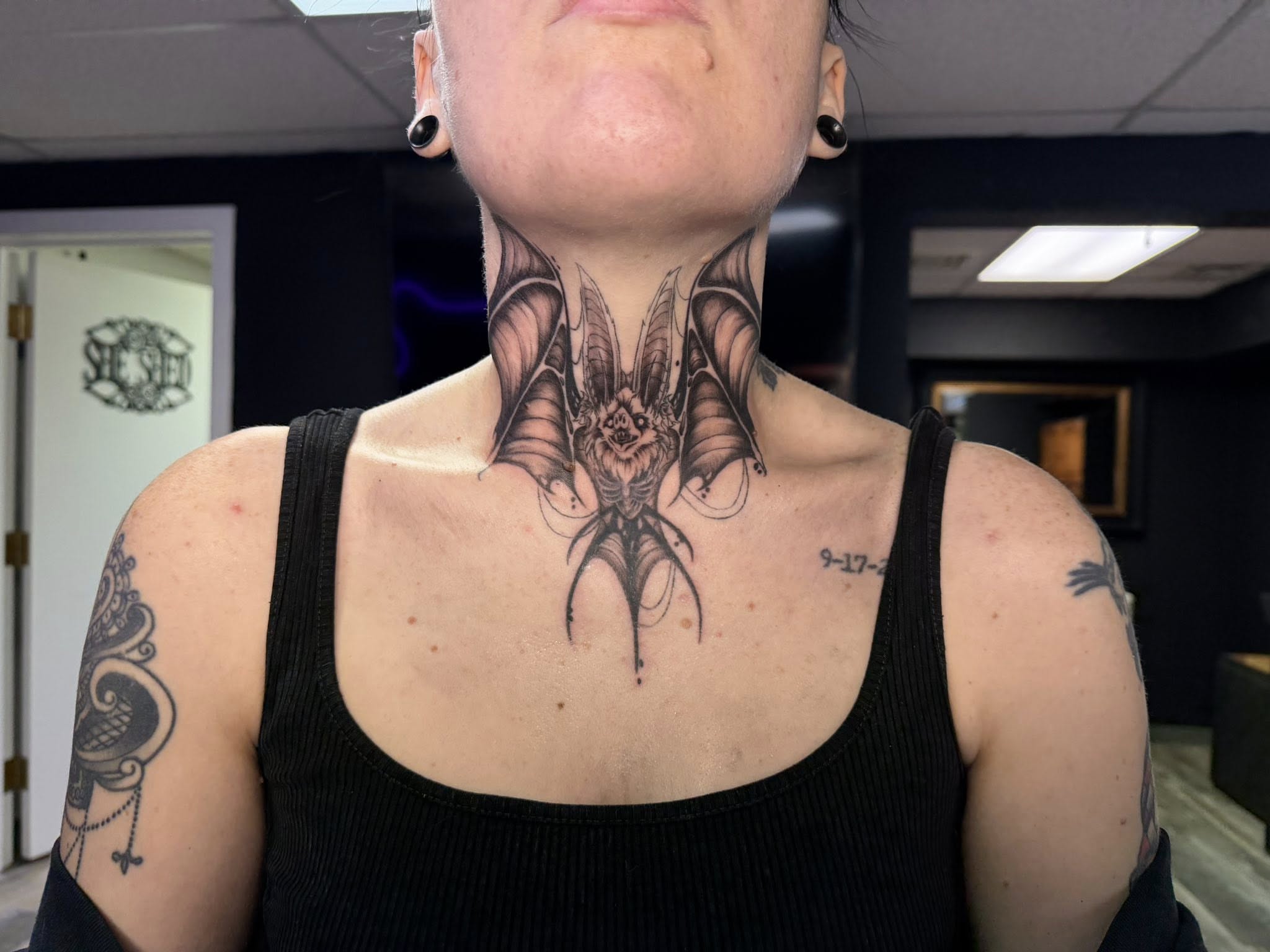Winged dragon geometric tattoo on the neck by ✶ teryn ✶, Akron, Ohio