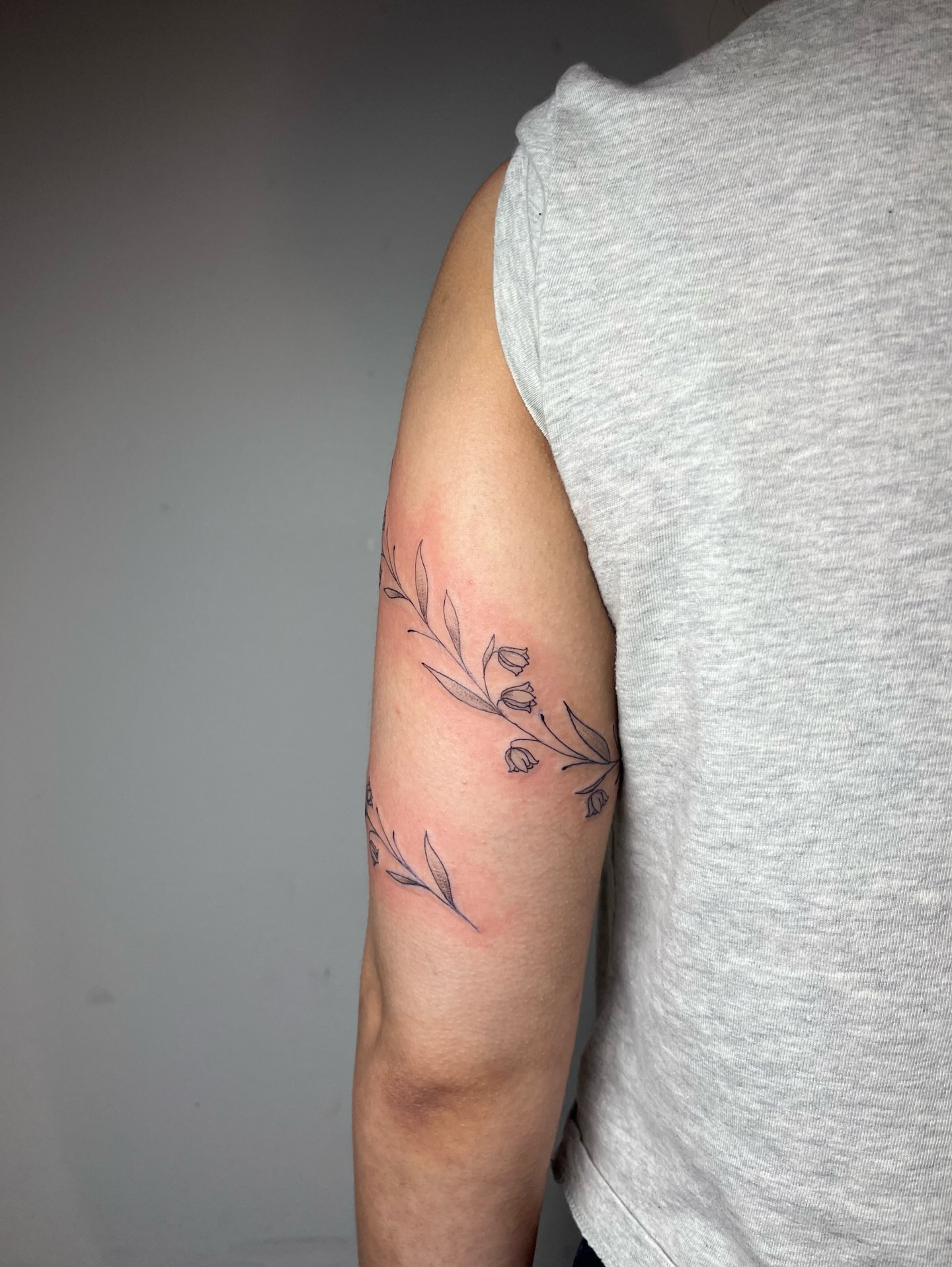 Floral arrangement fine line tattoo on the forearm by brinley - fine line tattoos, Crescent Springs, Kentucky
