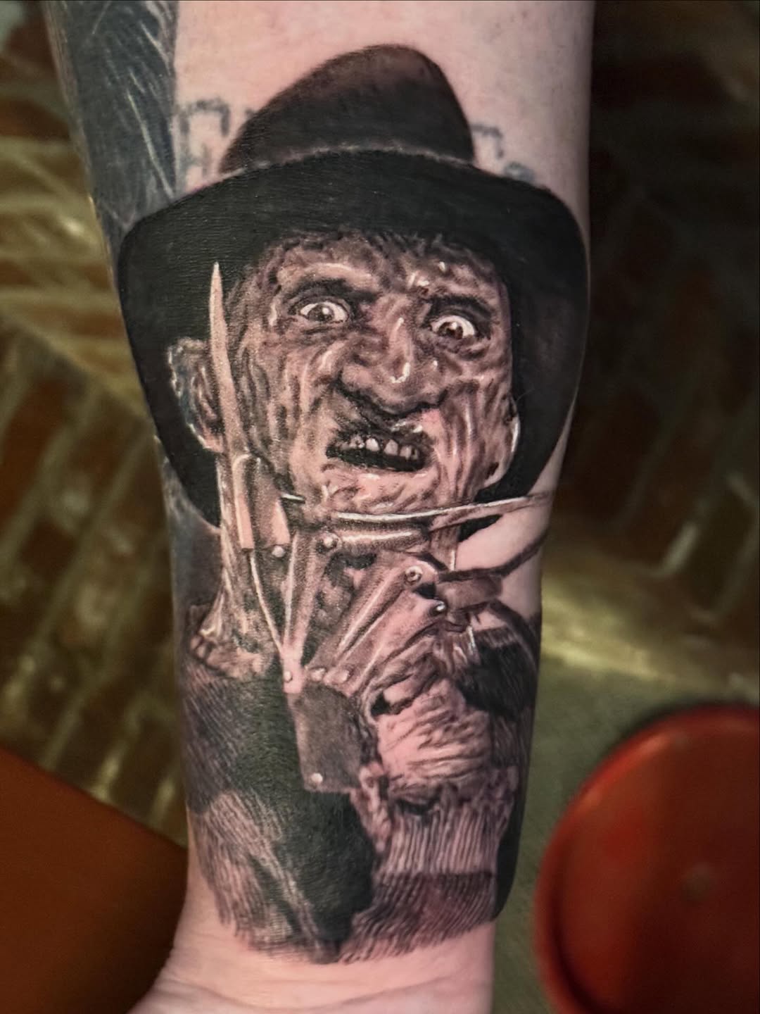 Tattoo by @iconicinkkevin — realism, dark_realism