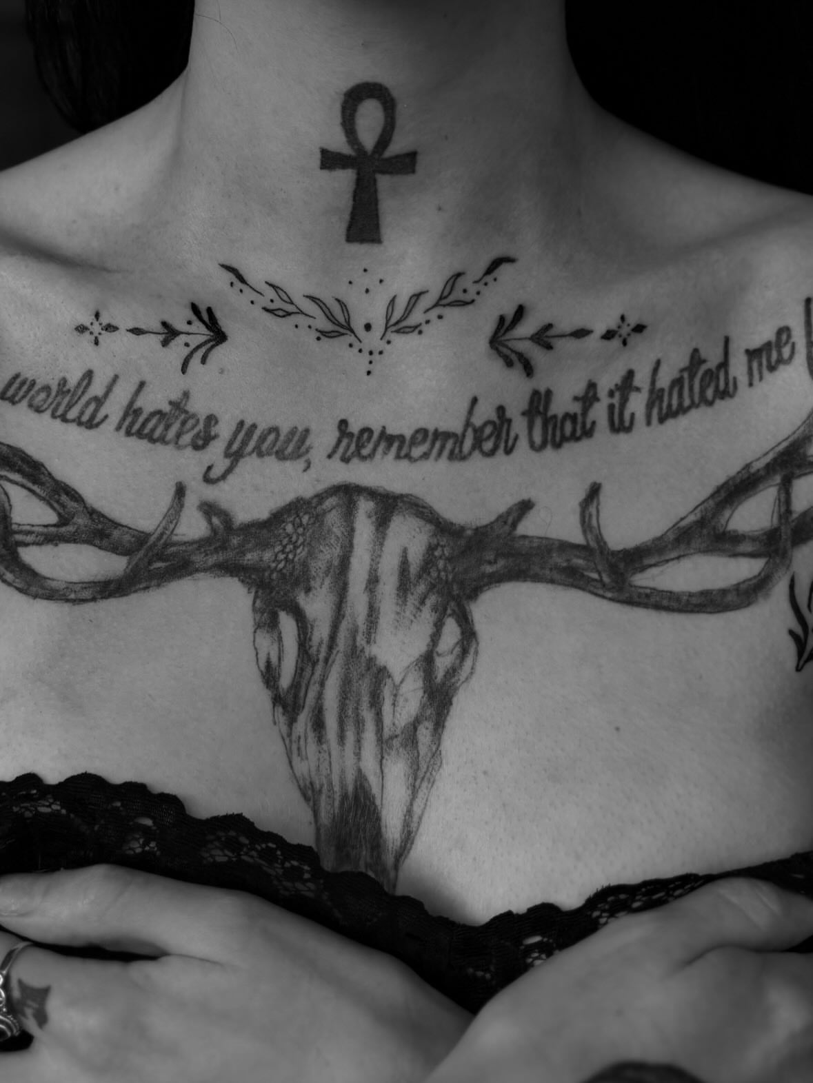 Deer skull realism tattoo on the chest by Lauren Deets