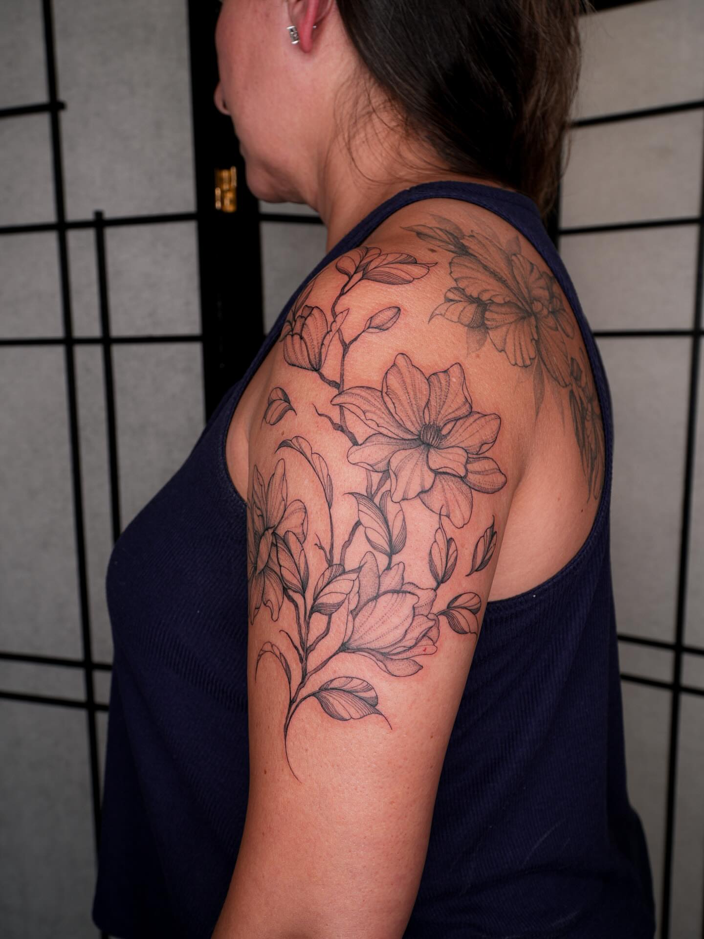 Floral arrangement black and grey tattoo on the shoulder by Pandora ✨ Floral, Los Angeles, California