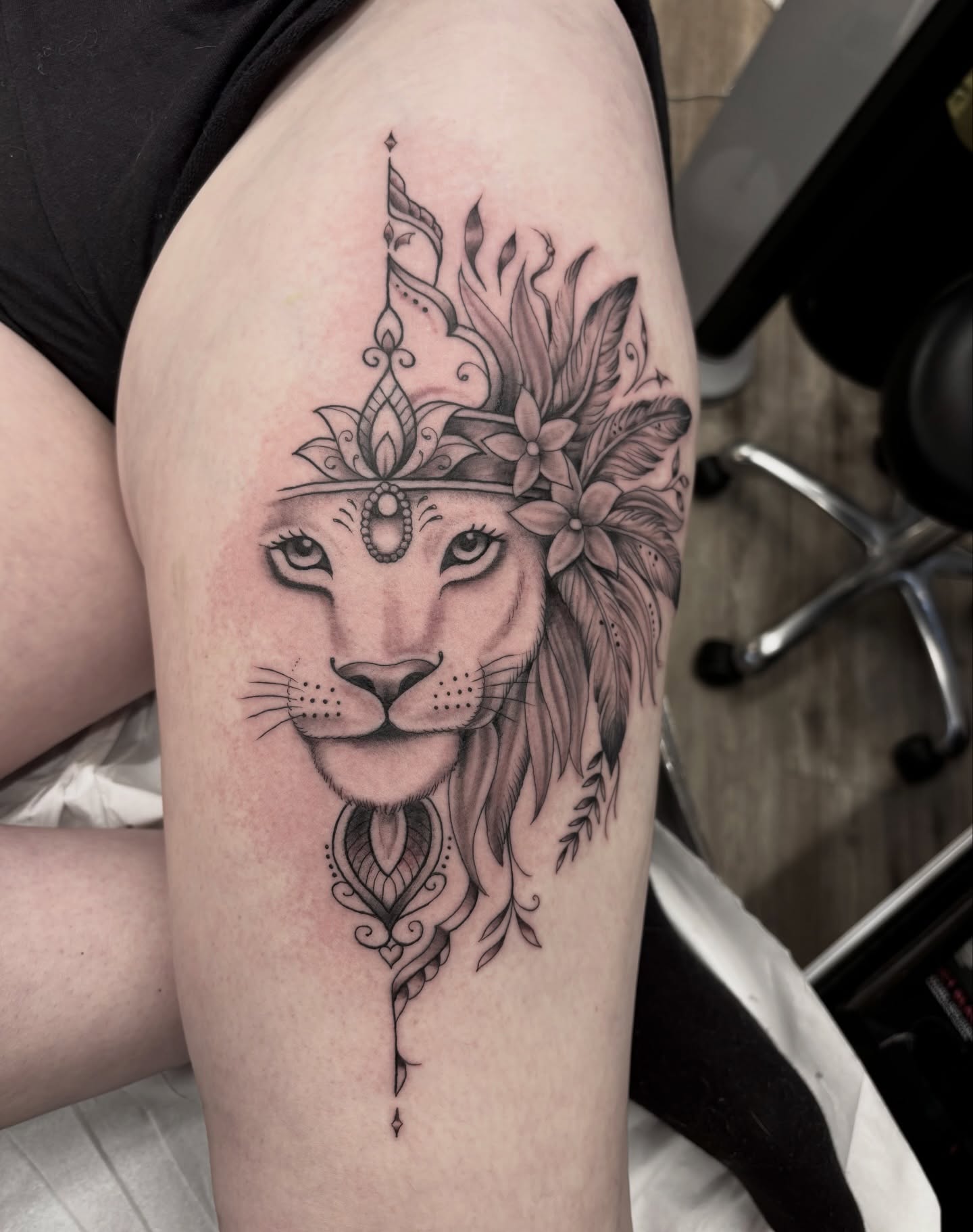 Lion geometric tattoo on the thigh by Ruth Ormsby-Ashworth