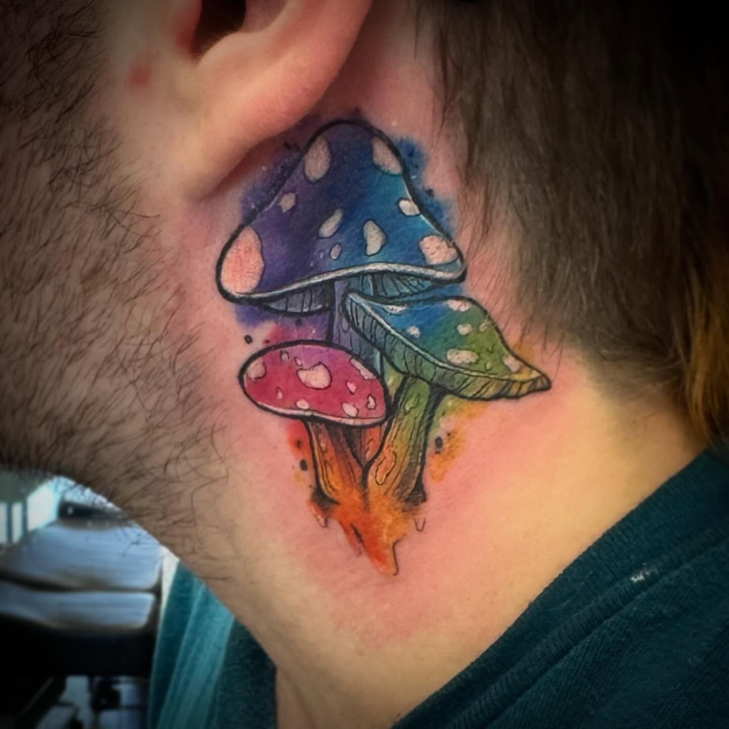 Mushrooms watercolor tattoo on the neck by Darbi "Marbles"