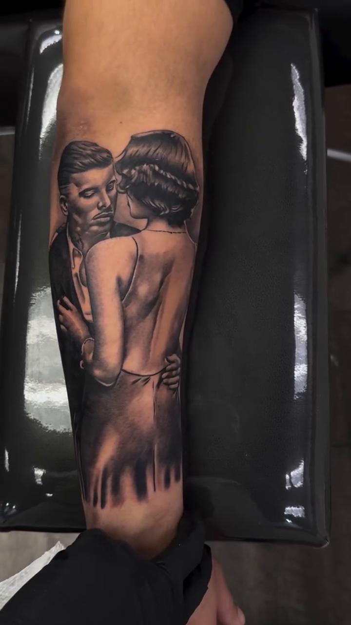 Couple embracing realism tattoo by Tattoos By Kique