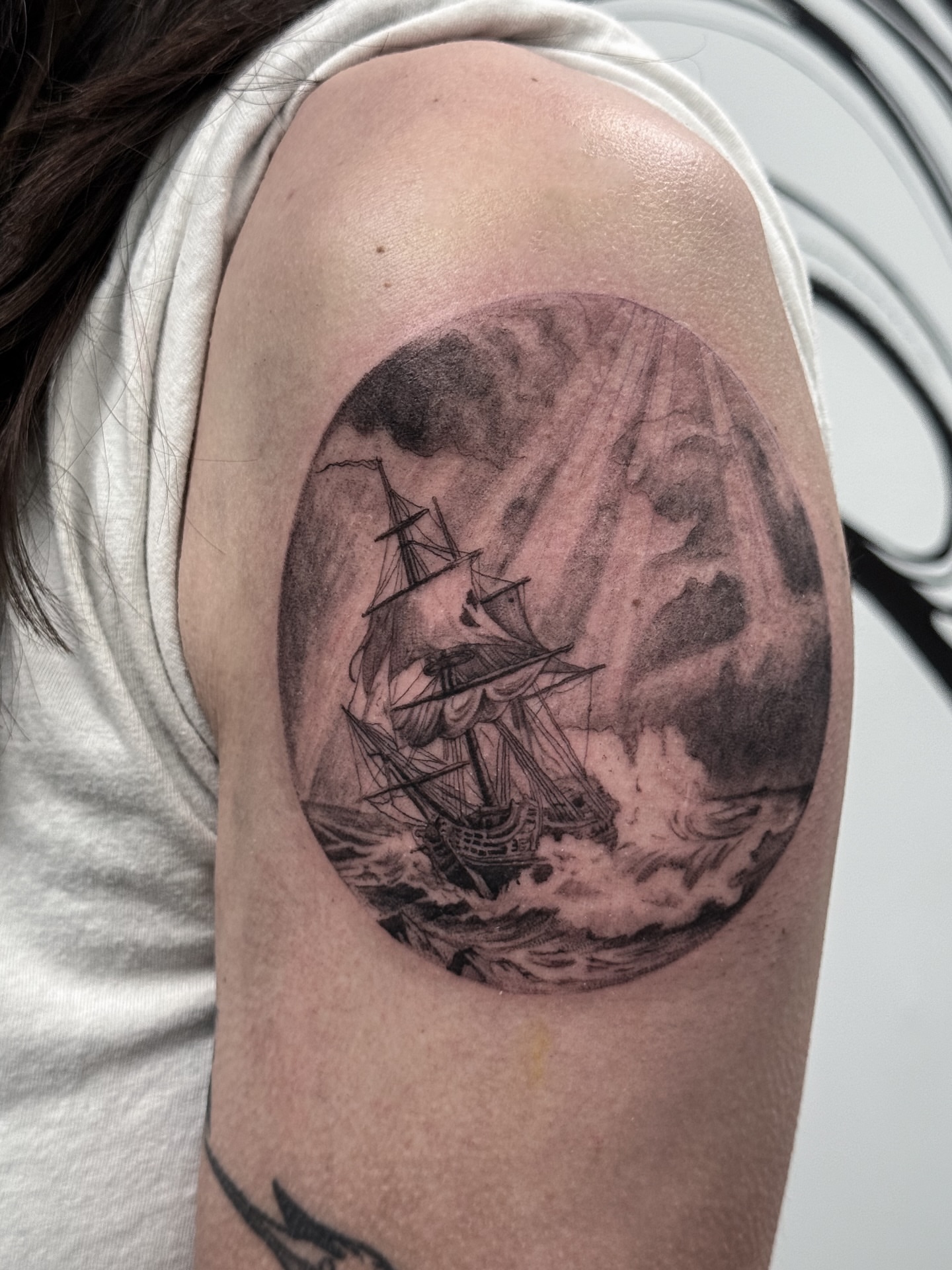 Ship sailing storm realism tattoo on the shoulder by Brows & Tattoos
