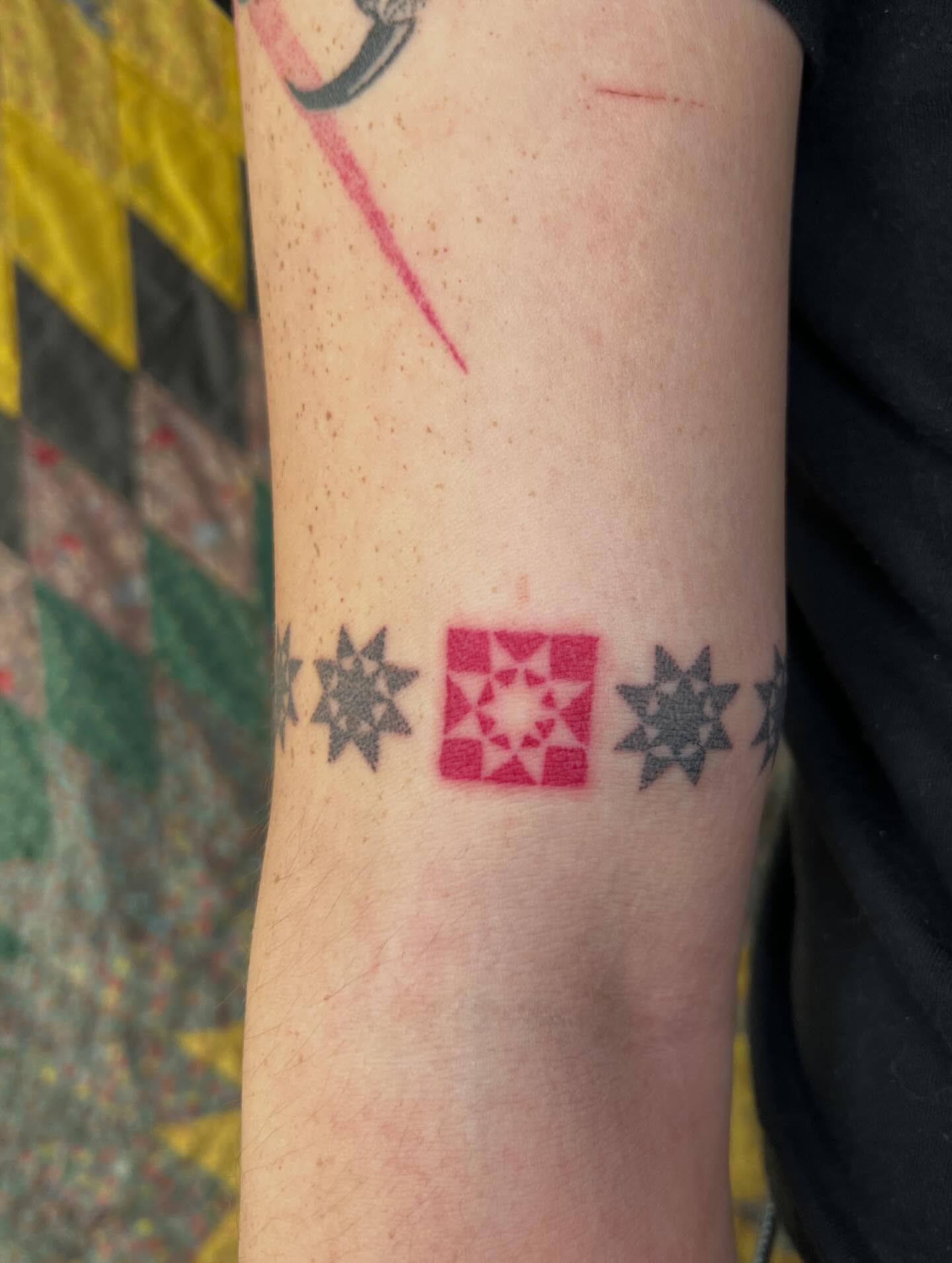 Geometric pattern geometric tattoo on the forearm by faith