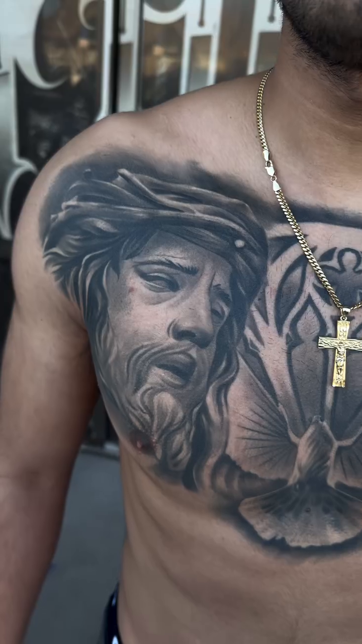 Jesus Christ and Mary realism tattoo by Tattoo