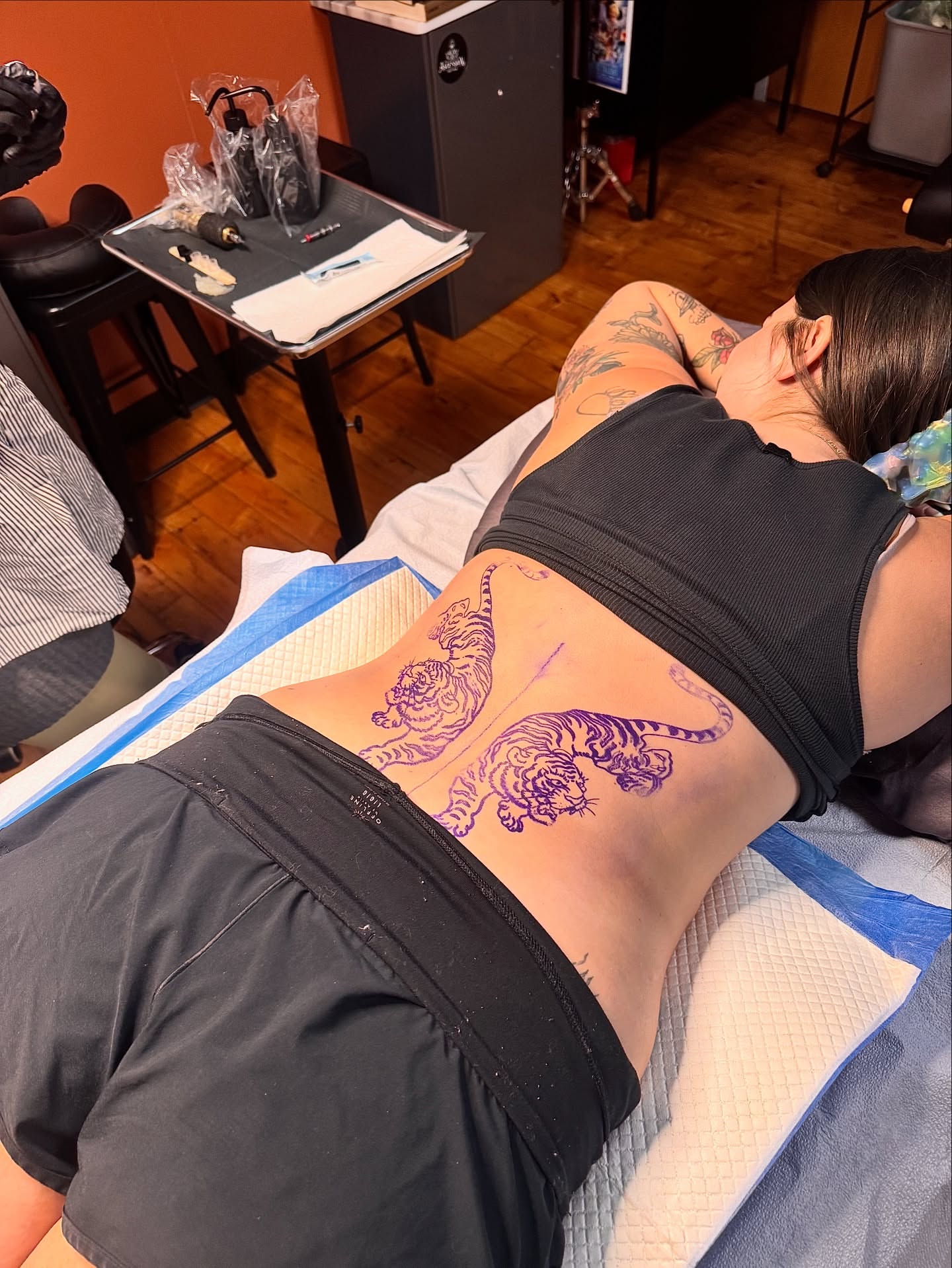 Tigers American traditional tattoo on the torso by Kelly Von Tattoos, Saxapahaw, North Carolina