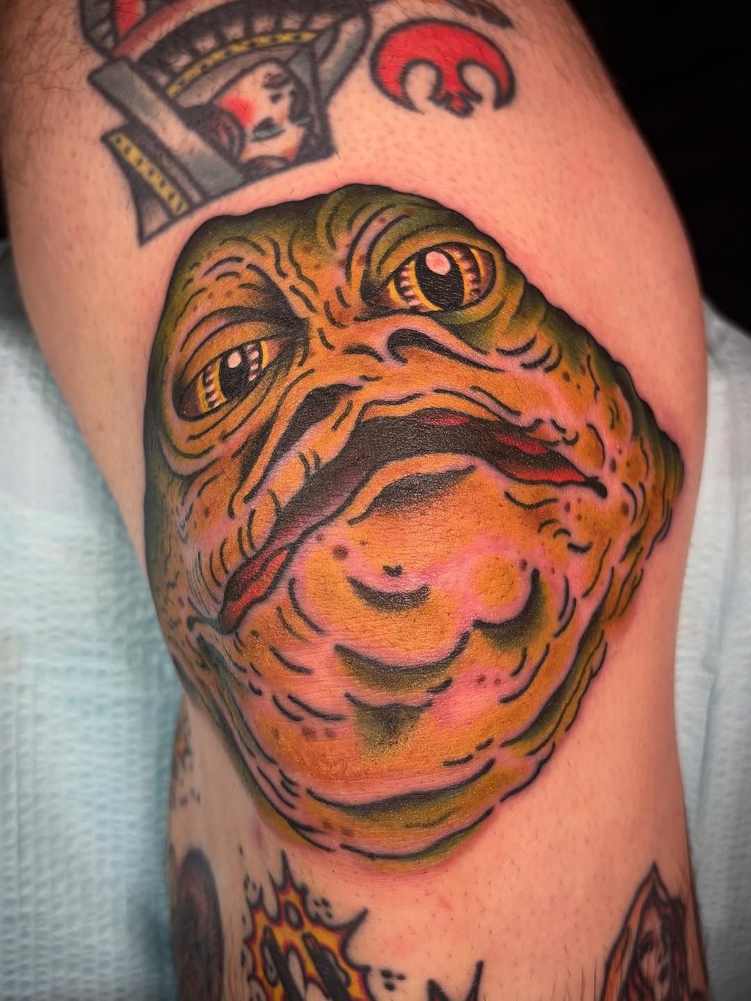 Jabba the Hutt American traditional tattoo on the thigh by Tom Wenzell