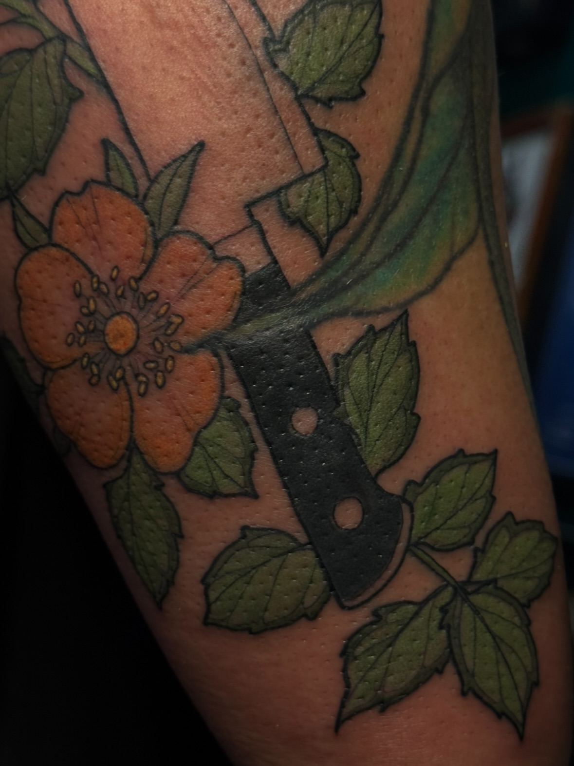 Flower and knife American traditional tattoo on the forearm by jess jené jones, Portland, Oregon