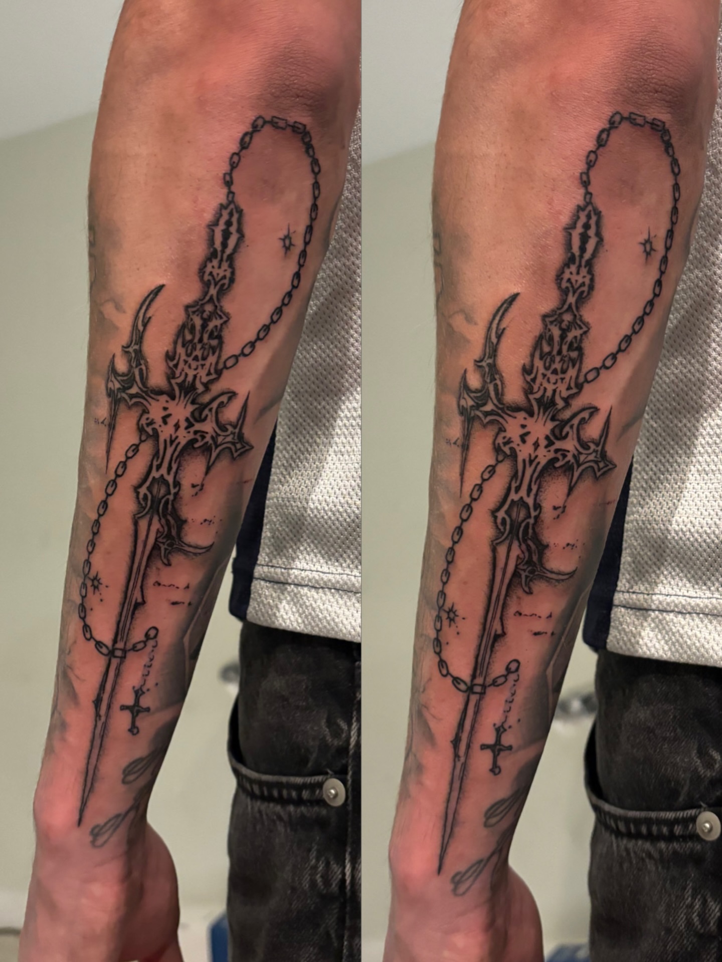 Trident and chain black and grey tattoo on the forearm by @miffythereaper