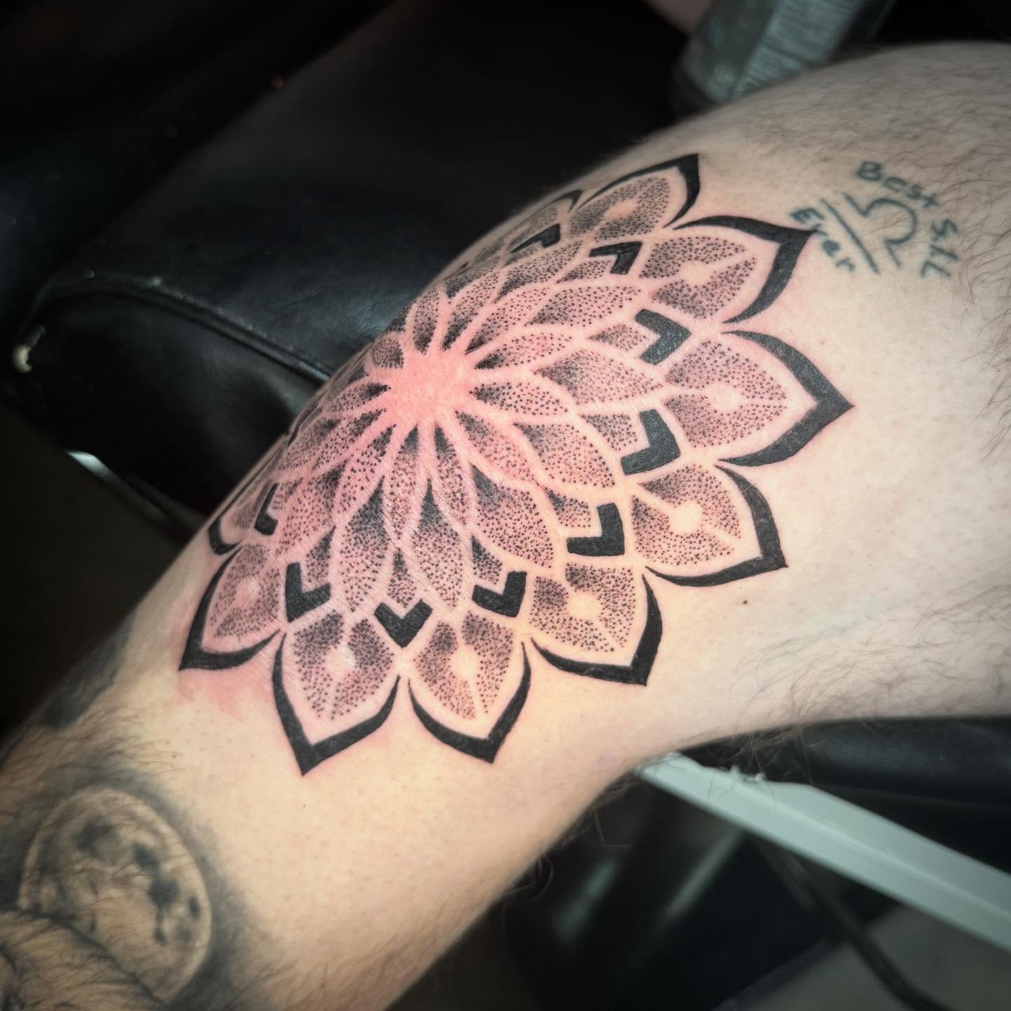 Lotus flower dotwork tattoo on the forearm by Jameson William Cowan